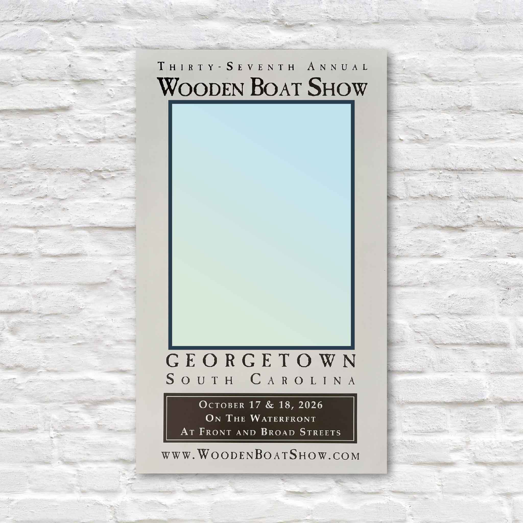 Teaser image for the official 2026 Georgetown Wooden Boat Show poster, featuring a question mark in place of the artwork ahead of the official artist and poster reveal, coming soon to Gray Man Gallery in Pawleys Island, South Carolina.