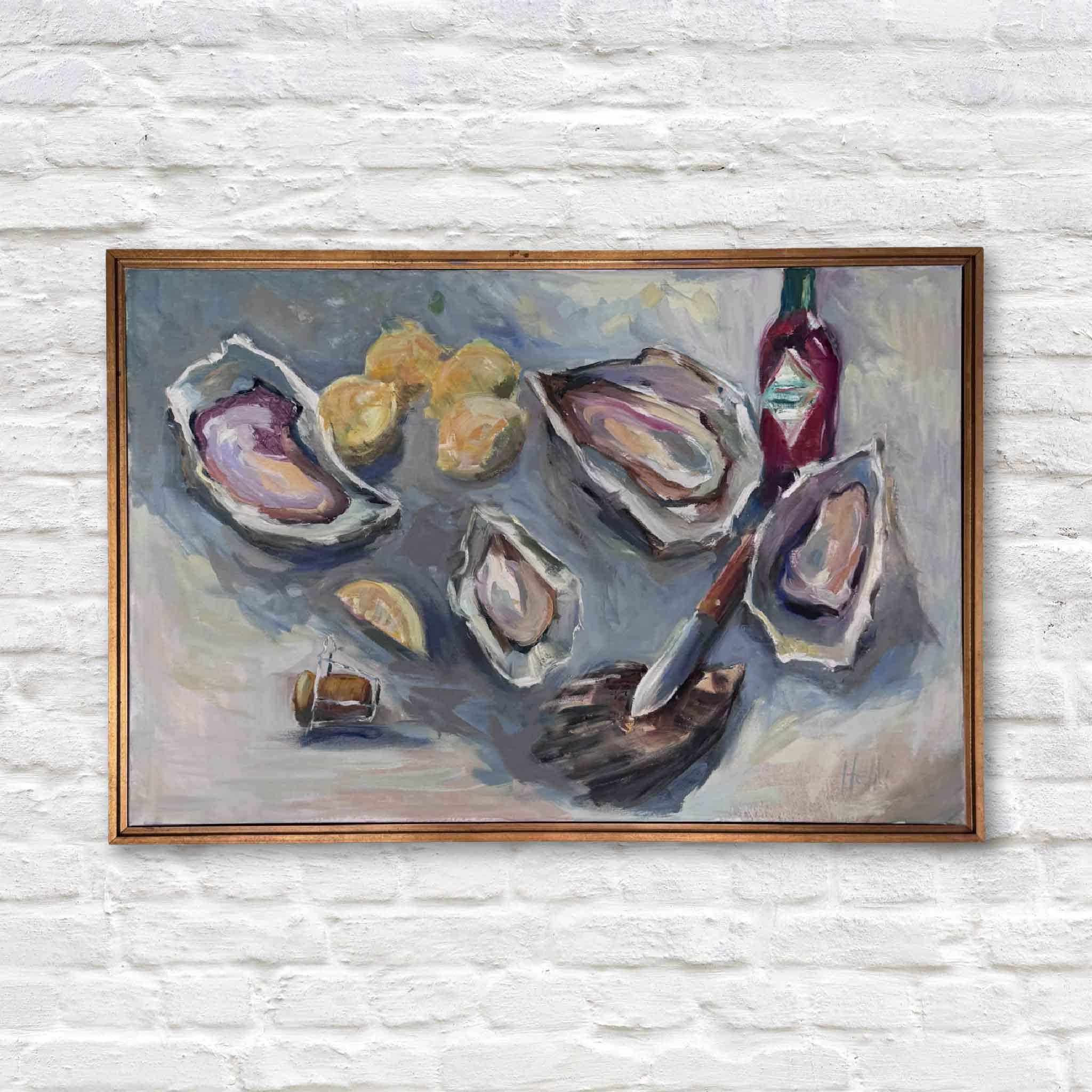 Framed painting of oysters and lemons on a white brick wall
