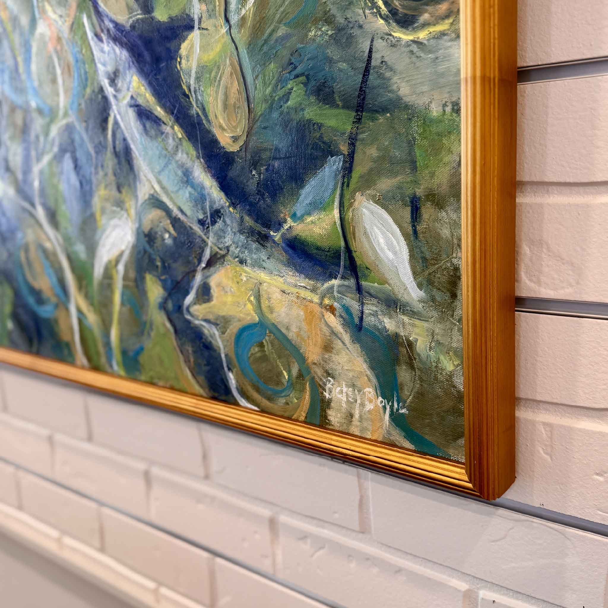 Framed abstract painting of sailfish swimming among seaweed, rendered in bold brushstrokes of blue, green, and white with hints of gold and teal. The artwork has a dynamic, swirling composition