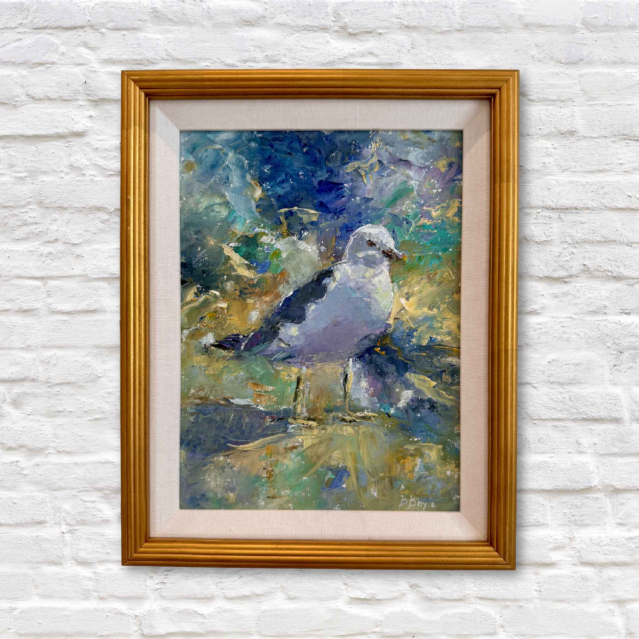 framed oil painting of a sea gull with a colorful background on a white brick wall