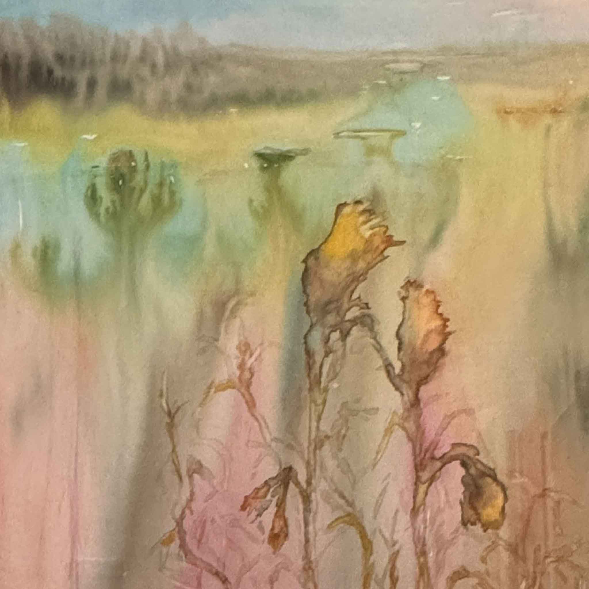 “Summer Haze” watercolor painting by Joanne Willoughby featuring a dreamy Lowcountry marsh scene with soft pastel colors, framed in gold and displayed at Gray Man Gallery in Pawleys Island, SC.