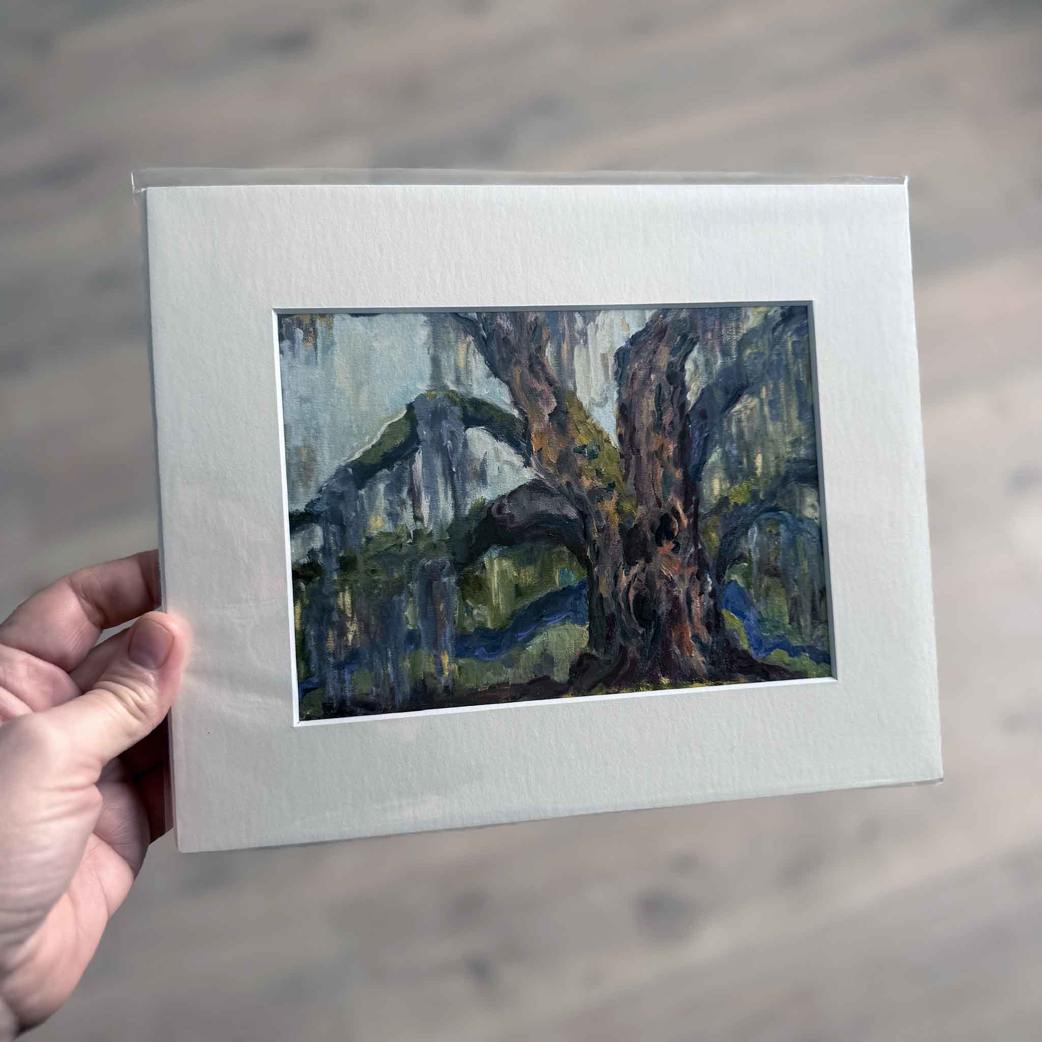 Matted art print of Graceful Rest by Jeanne O’Neal, featuring a majestic live oak tree draped in Spanish moss, painted in expressive Lowcountry tones — exclusive to Gray Man Gallery.