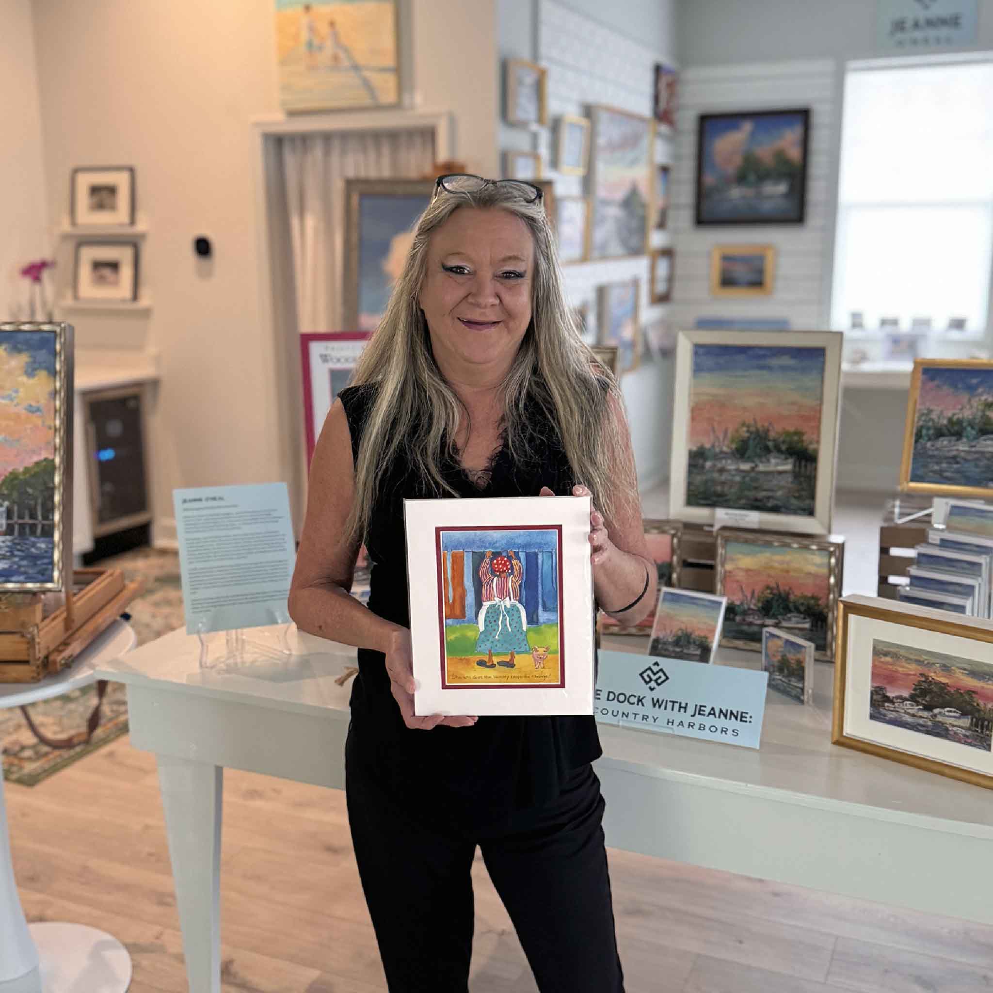 Keep the Change print by Vida Miller, colorful Little Ladies artwork featuring woman hanging laundry with humorous caption, matted to 8x10. Pictured at Gray Man Gallery.