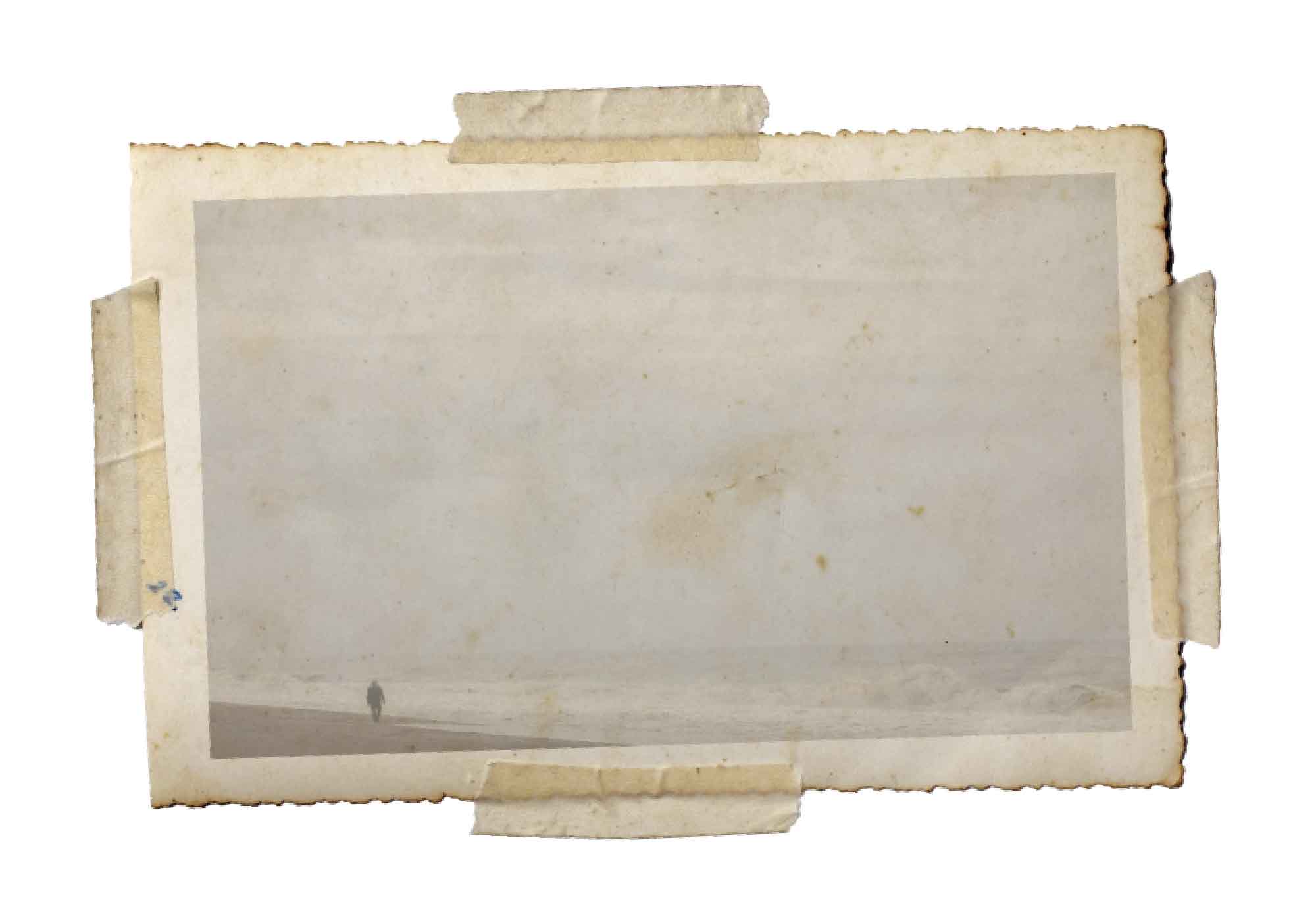 Vintage photograph of a man on the beach with a white background