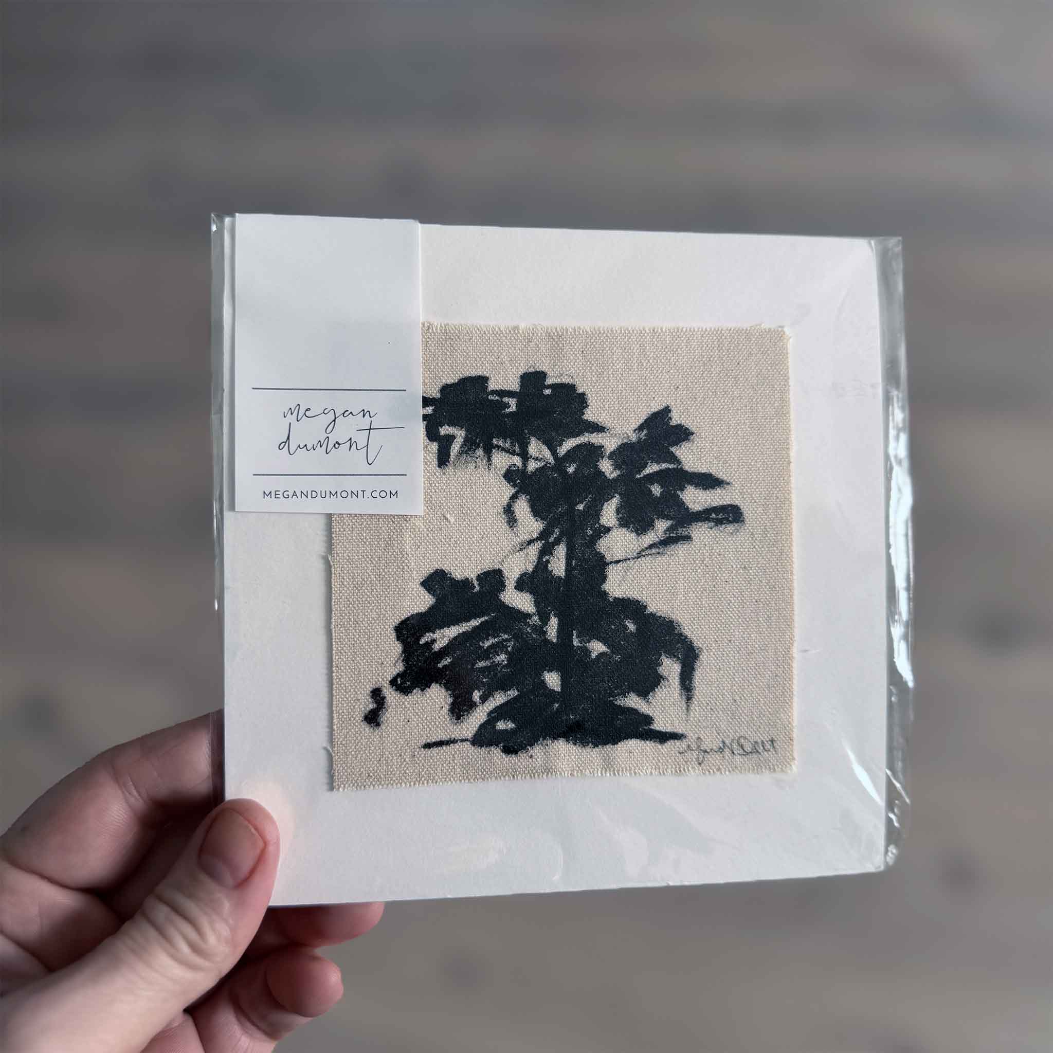 Original canvas painting by Megan Dumont featuring a bold abstract tree silhouette, matted and ready for framing.