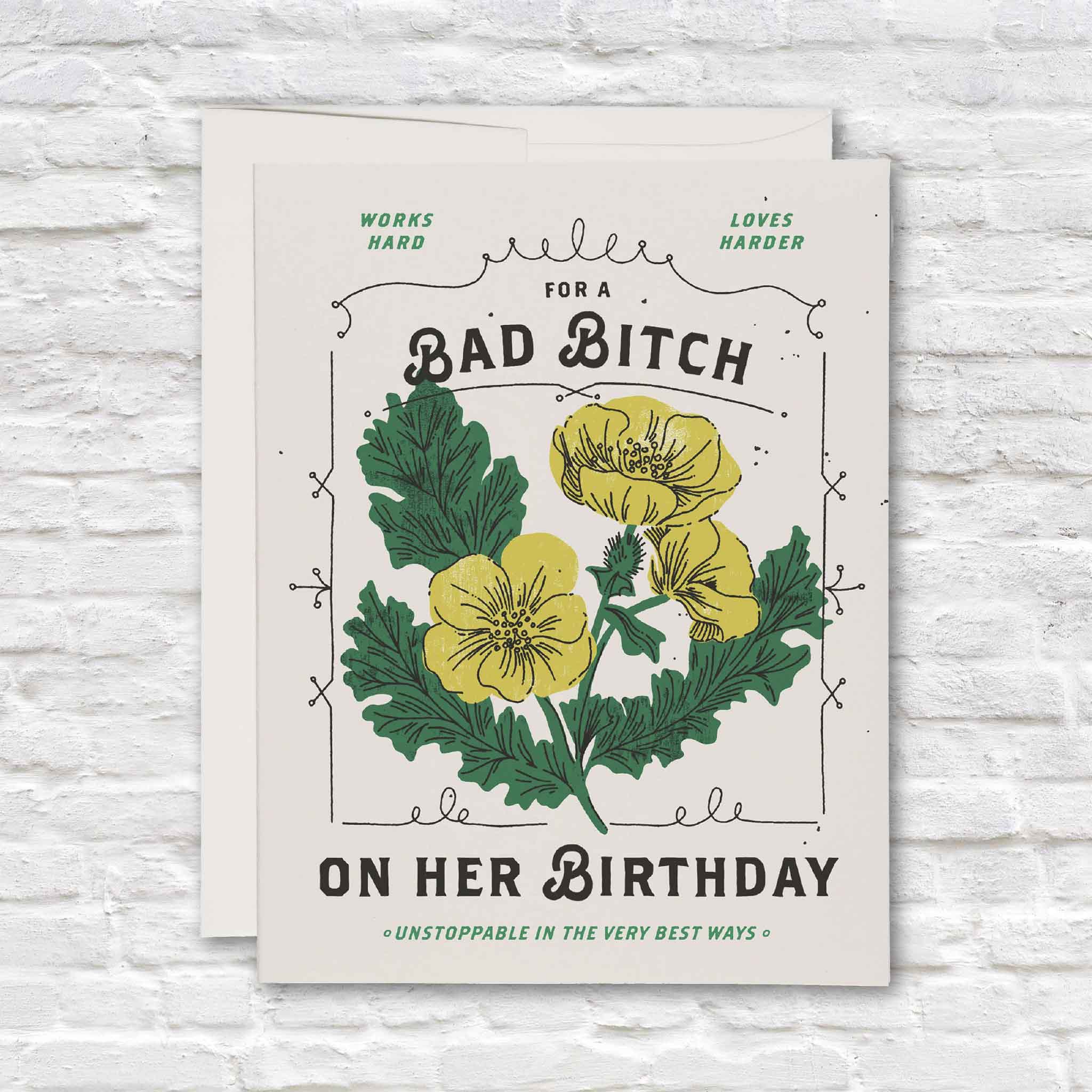 Bad Bitch funny birthday card for her featuring retro yellow flowers and green botanical artwork with the message “For a Bad Bitch on Her Birthday,” available at Gray Man Gallery in Pawleys Island, South Carolina.