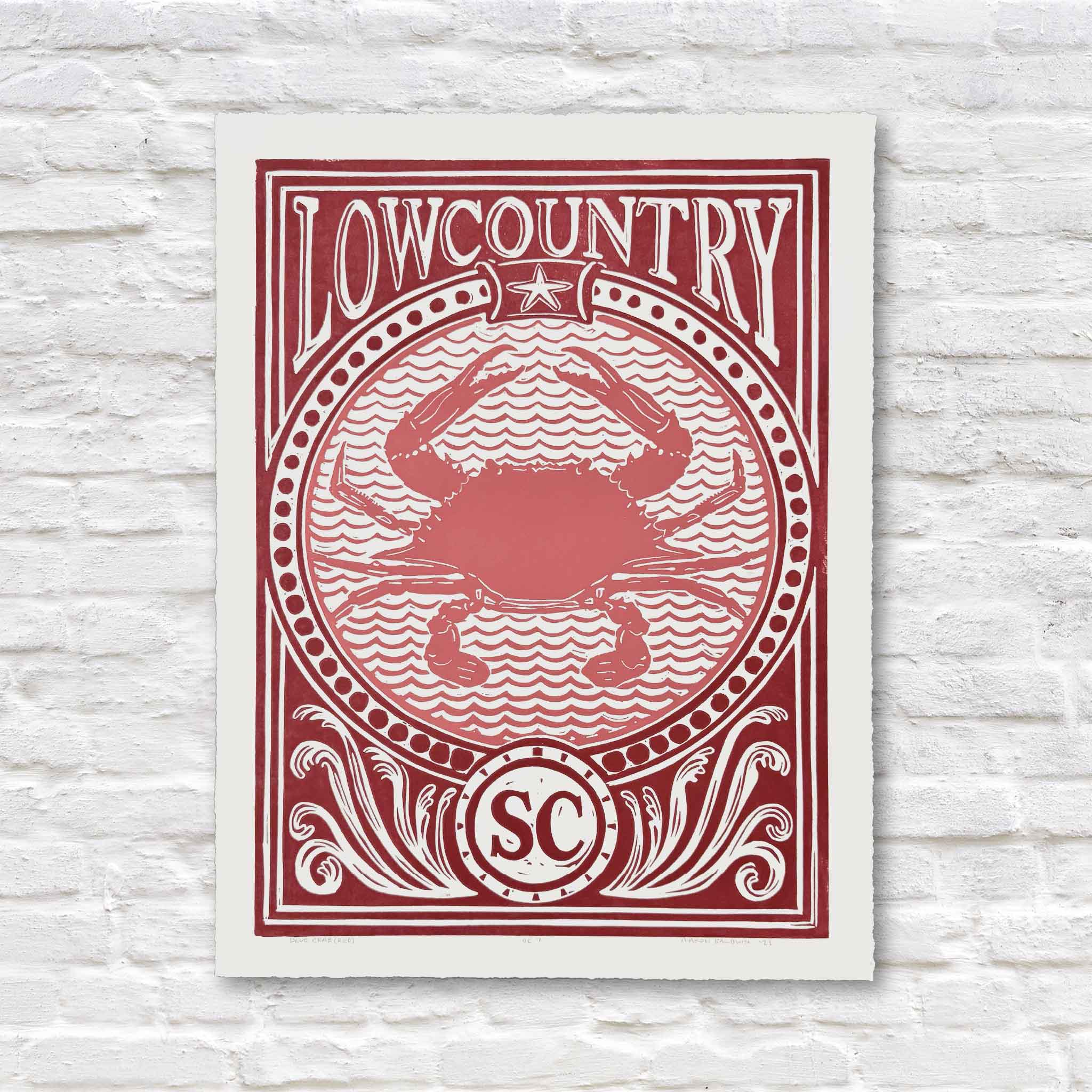 Blue Crab linocut print by Aaron Baldwin in red ink, featuring a stylized crab and Lowcountry coastal motifs.