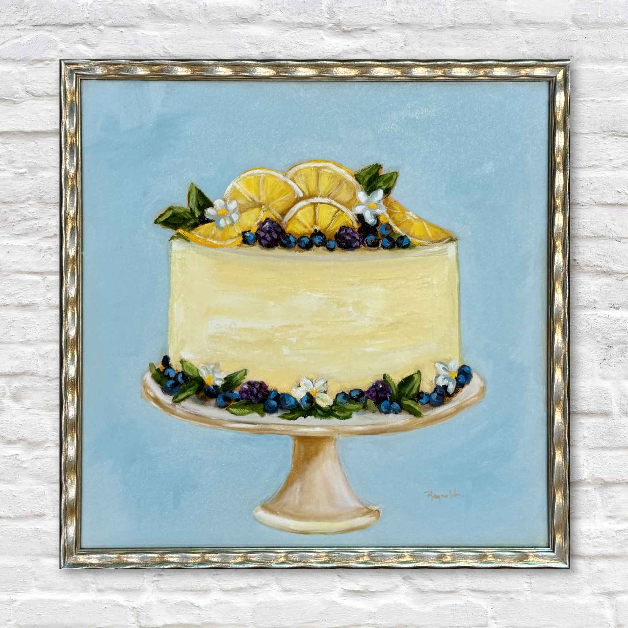 Blueberry Cream by Jenny Reynolds, an original oil painting from the Southern Sweets Collection featuring a frosted cake topped with blueberries, lemon slices, flowers, and greenery in an elegant gold frame.