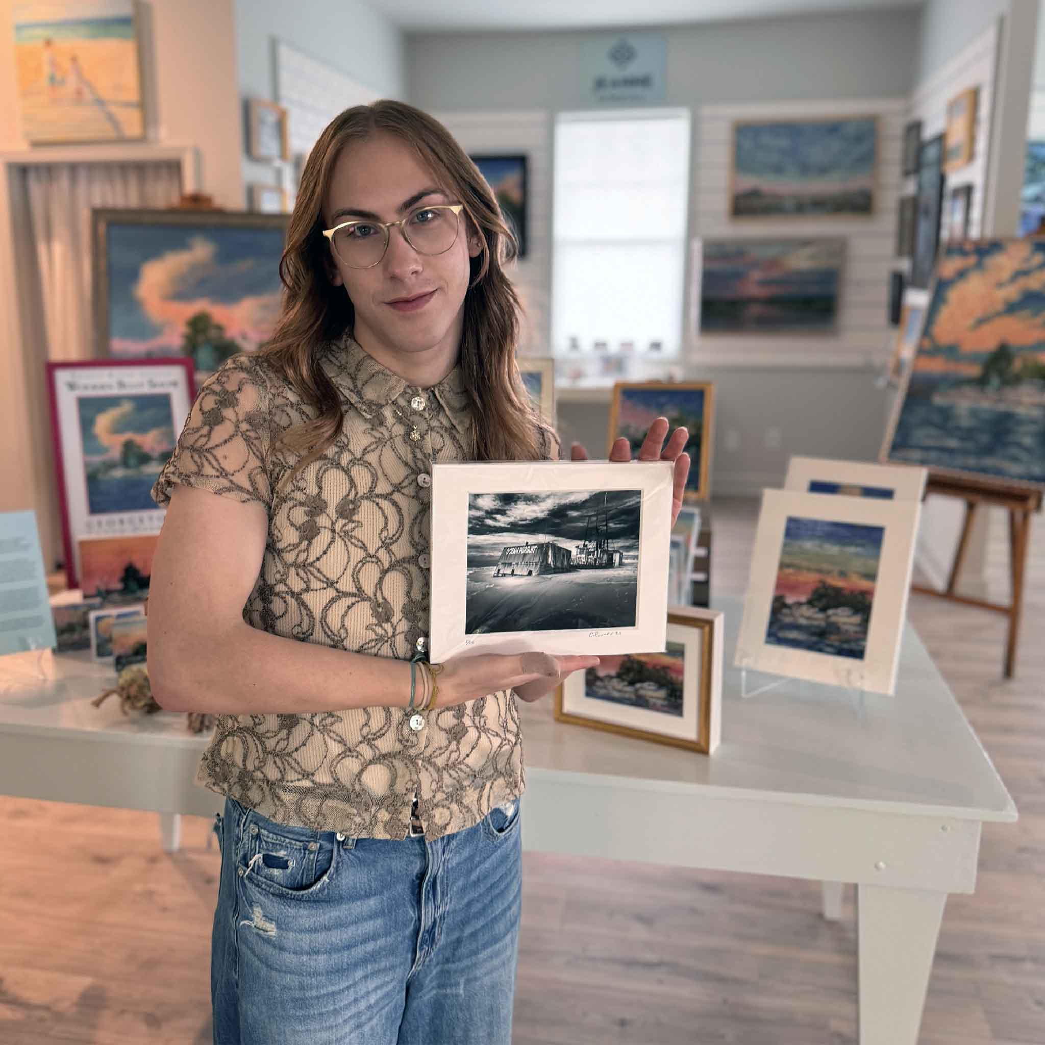 Black and white photo of a shipwreck on the Outer Banks of North Carolina, “Carolina #157” by photographer Chris Bruner, captured March 2021.
