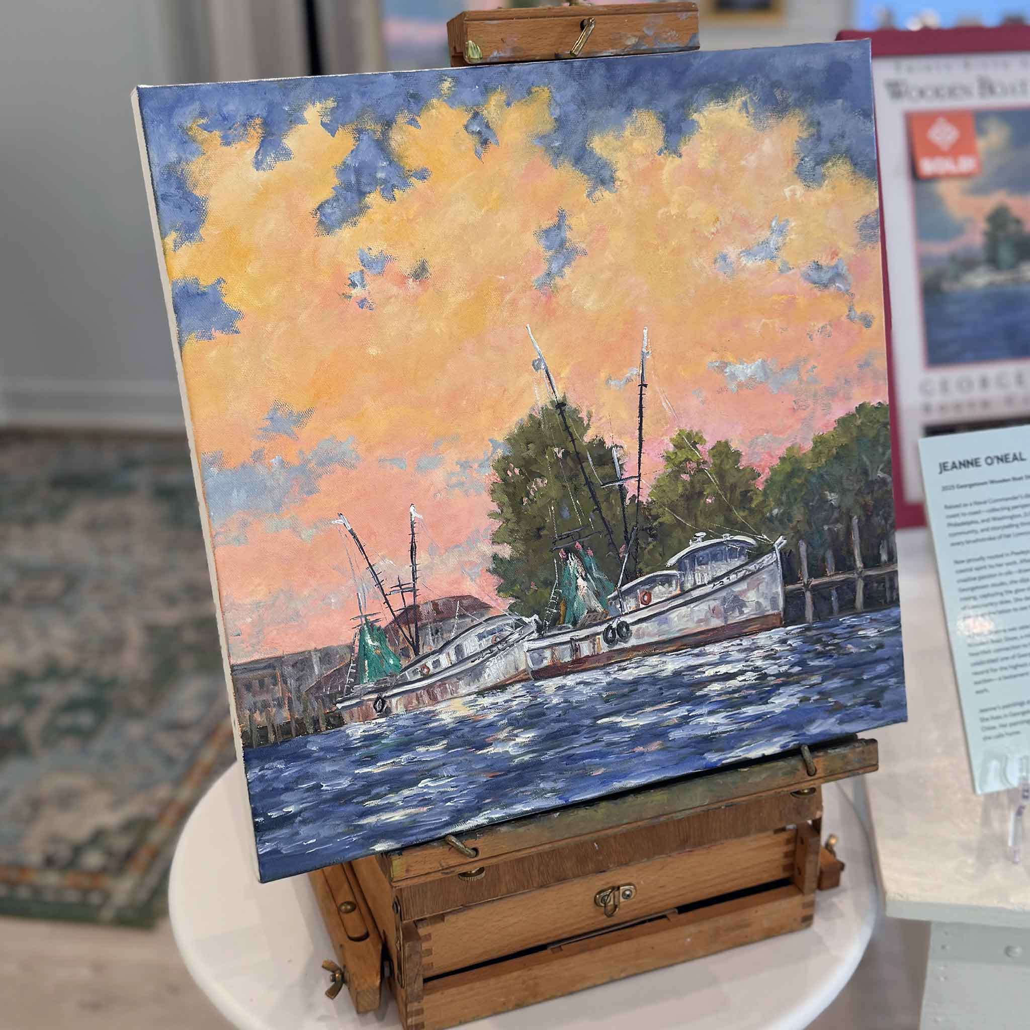 Dockside Light original oil painting by Jeanne O’Neal depicting shrimp boats at the Georgetown, South Carolina docks under a glowing sunset sky, 18x18 coastal art on gallery-wrapped canvas.