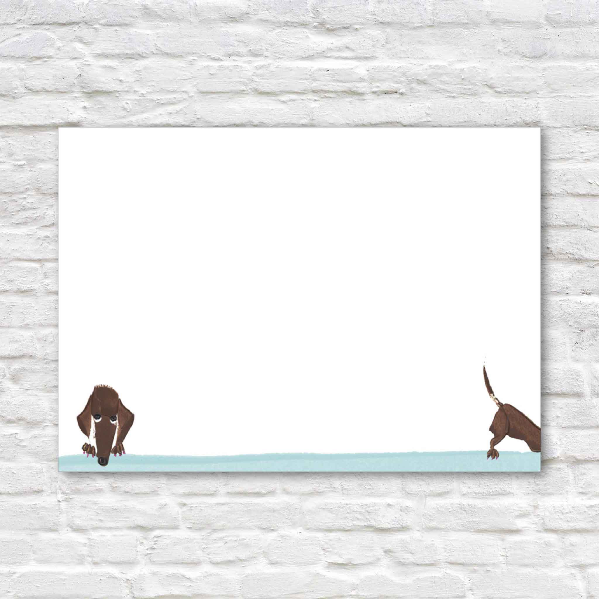 Doggy Paddle correspondence cards by Masaki Ryo featuring a playful dachshund design. Boxed stationery set includes 12 flat correspondence cards and 12 coordinating envelopes, printed in the USA and available at Gray Man Gallery in Pawleys Island.