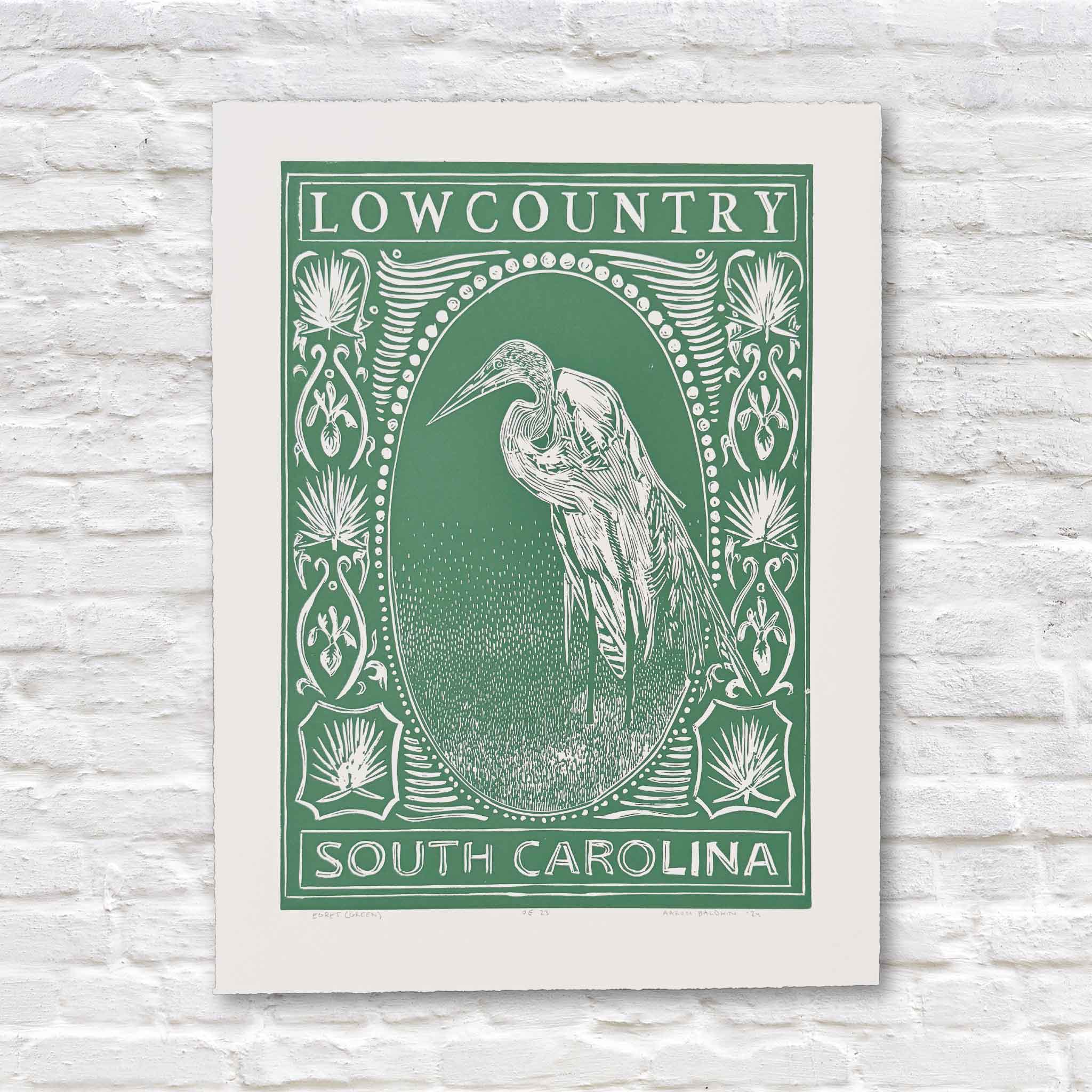 Egret linocut print by Aaron Baldwin in green ink, featuring a heron and Lowcountry motifs.
