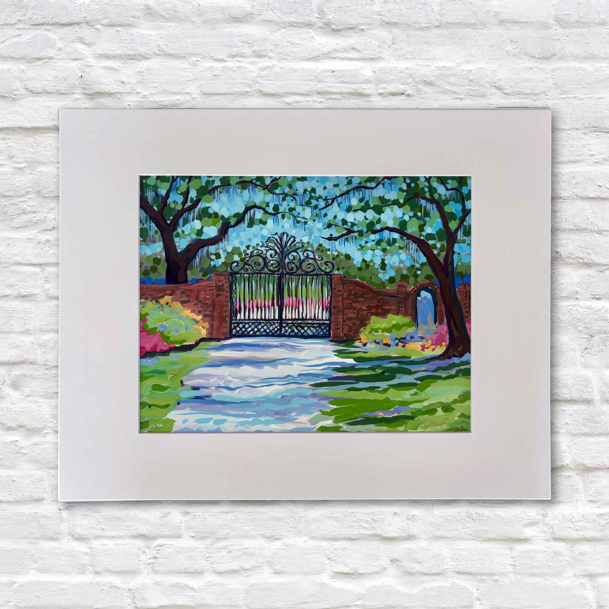 Litchfield Gate fine art print by South Carolina artist Elizabeth Sheats, featuring the historic wrought-iron gates of Litchfield Plantation beneath live oaks and Spanish moss in vibrant shades of blue, green and pink, professionally matted at Gray Man Gallery in Pawleys Island, South Carolina.