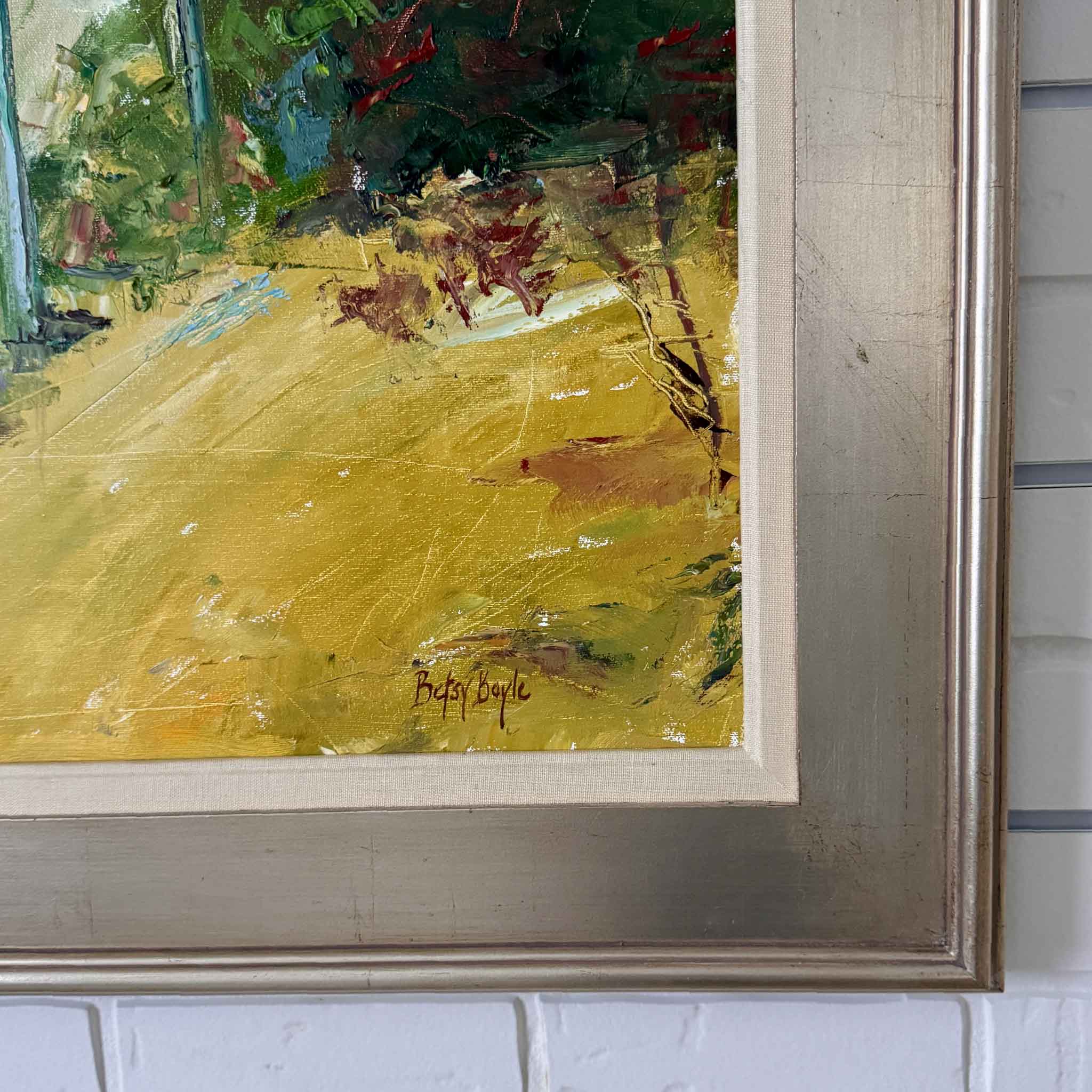 Close-up detail of Rich Hues by Betsy Boyle showing expressive oil brushwork, layered autumn color, the artist’s signature, and custom framing by Gray Man Gallery.