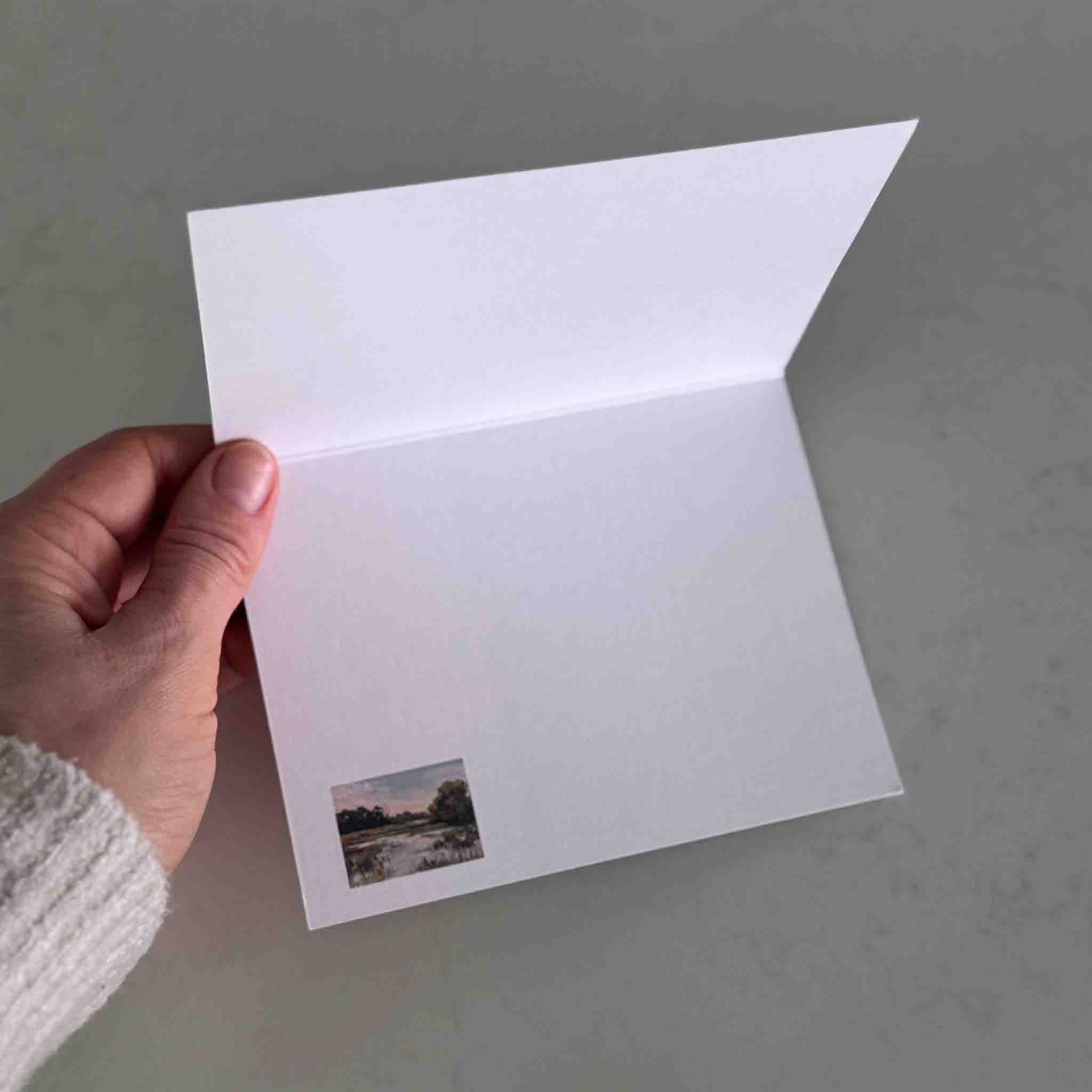 Inside view of a Wish You Were Here notecard by Jeanne O’Neal, shown open to display the blank interior for personal messages.