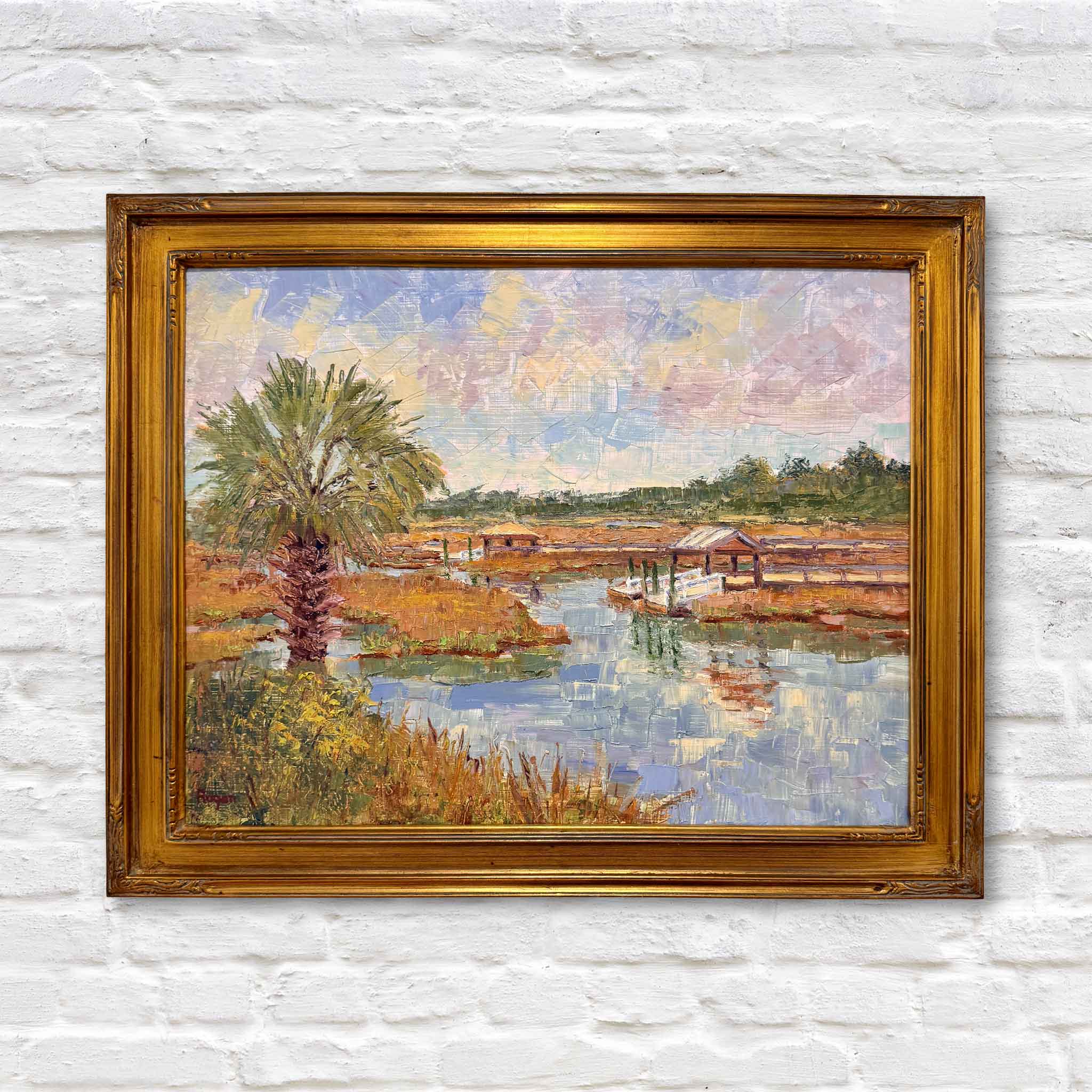 Original oil painting titled Creek with Palm by local artist Michael Rogan at Gray Man Gallery, depicting a Lowcountry creek, marsh grasses, and a palmetto beneath a pastel sky.