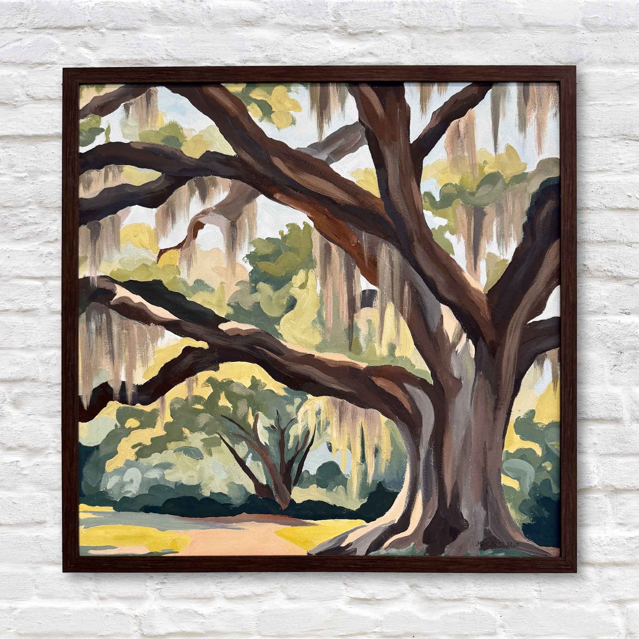Original acrylic gouache painting titled Brookgreen Oak by Megan DuMont, depicting a majestic live oak tree inspired by Brookgreen Gardens, shown framed and ready to hang. Pictured at Gray Man Gallery.