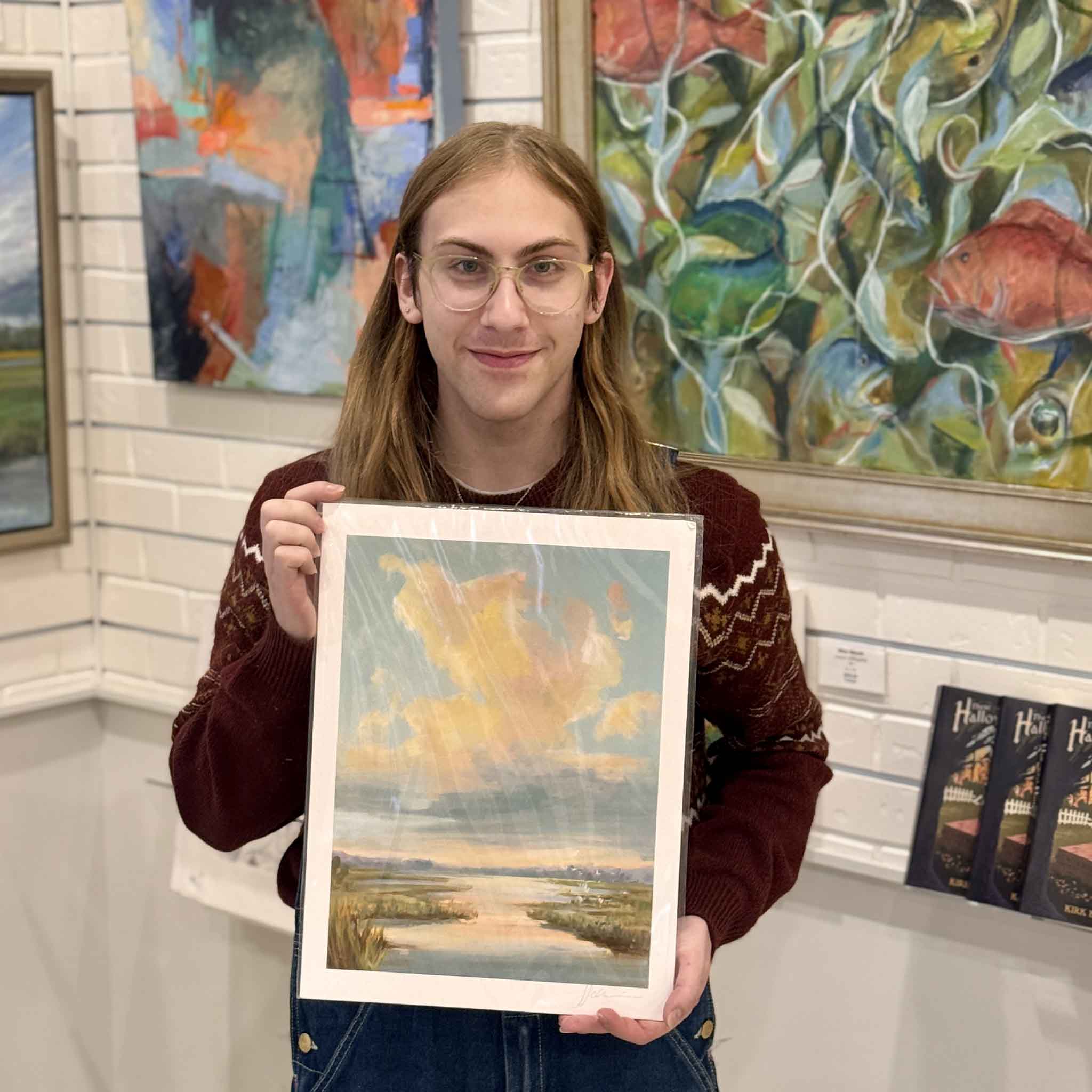 Helli Luck Evening Cloud art print showing a glowing sunset cloud over a Lowcountry marsh with soft reflections and warm coastal colors. Pictured at Gray Man Gallery.