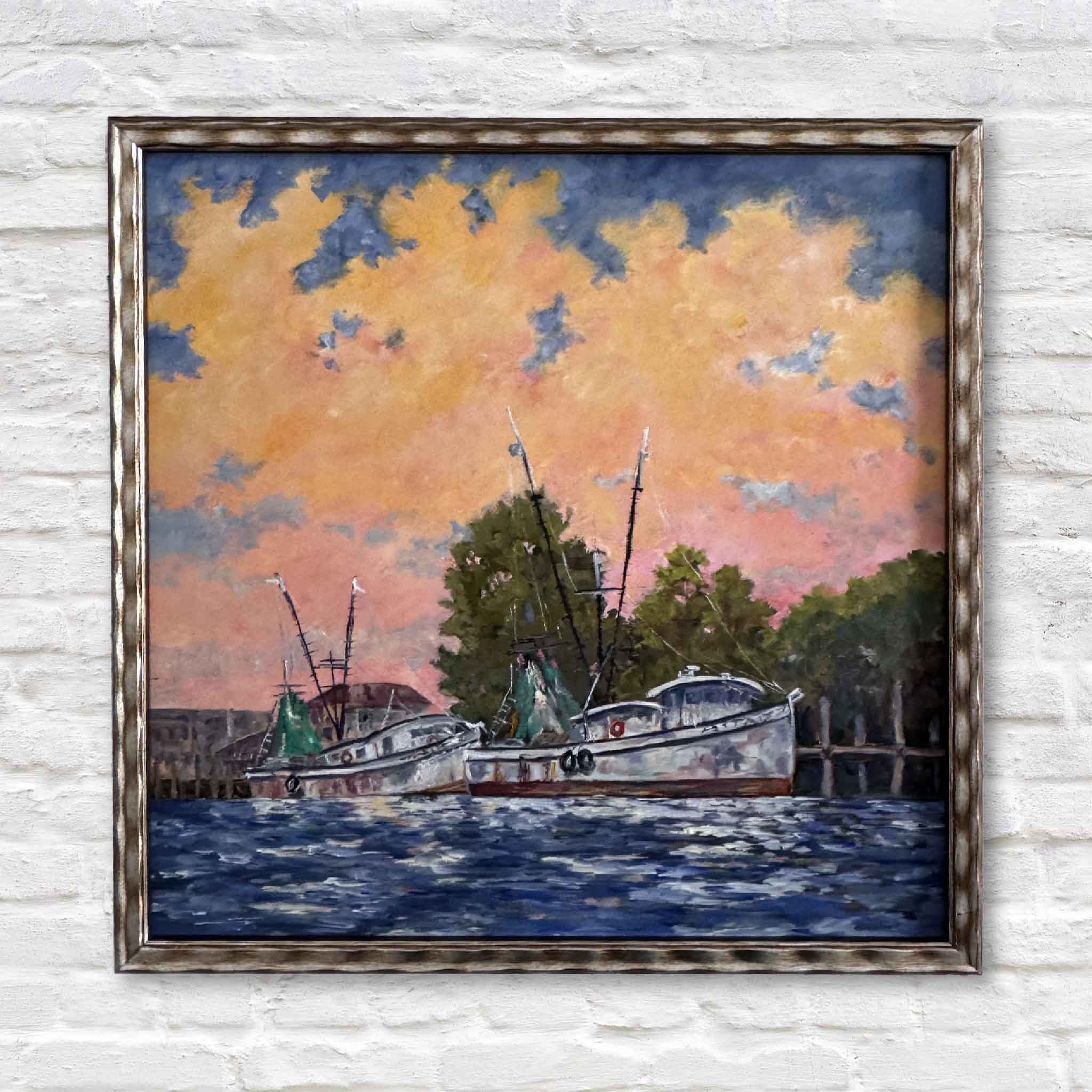 Framed original painting ‘Dockside Light’ by Jeanne O’Neal showing shrimp boats docked at sunset along the Georgetown, SC waterfront.