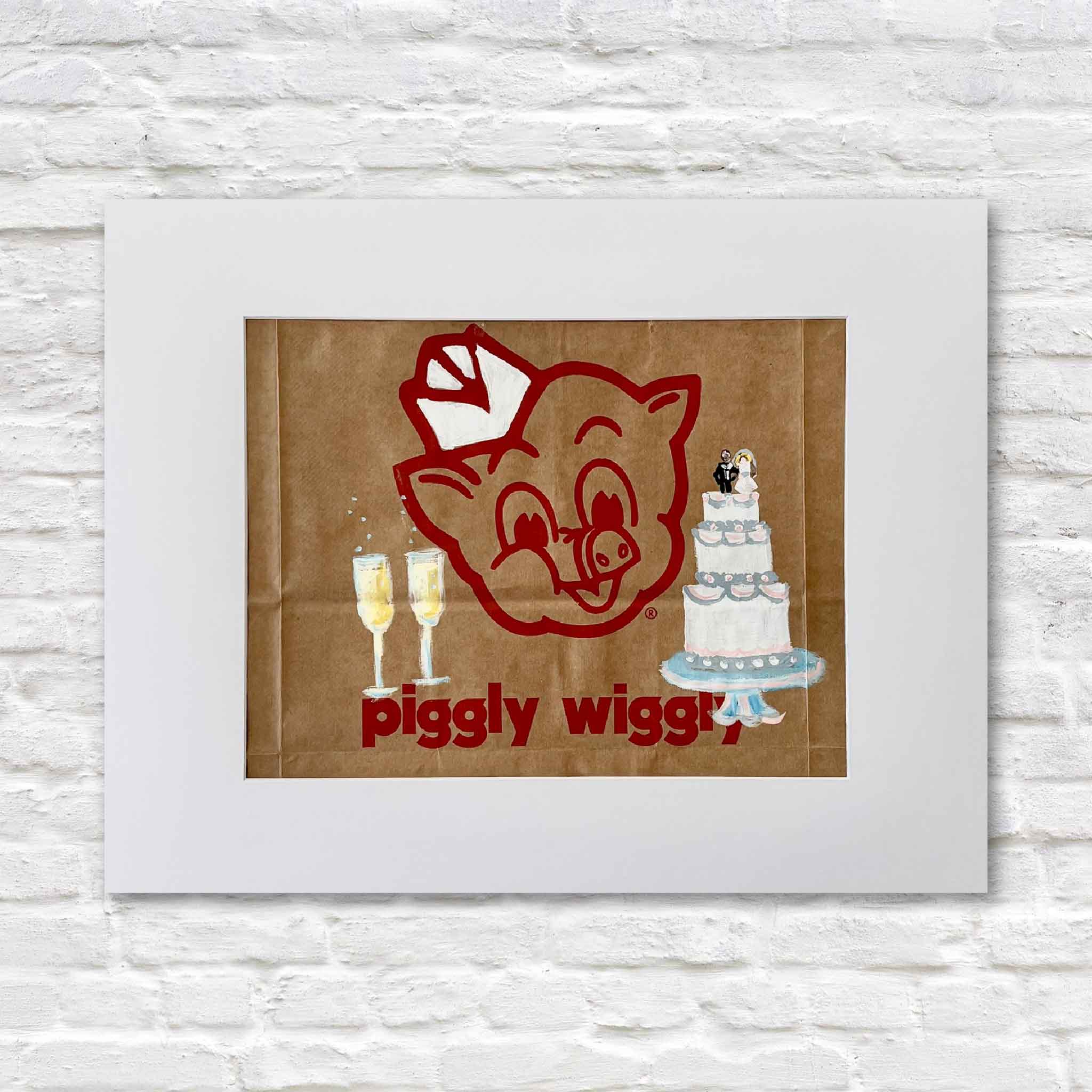 Original Piggly Wiggly Wedding Bells painting by local artist Jenny Reynolds at Gray Man Gallery, hand-painted on an authentic grocery bag featuring champagne flutes and a tiered wedding cake beneath the iconic pig logo