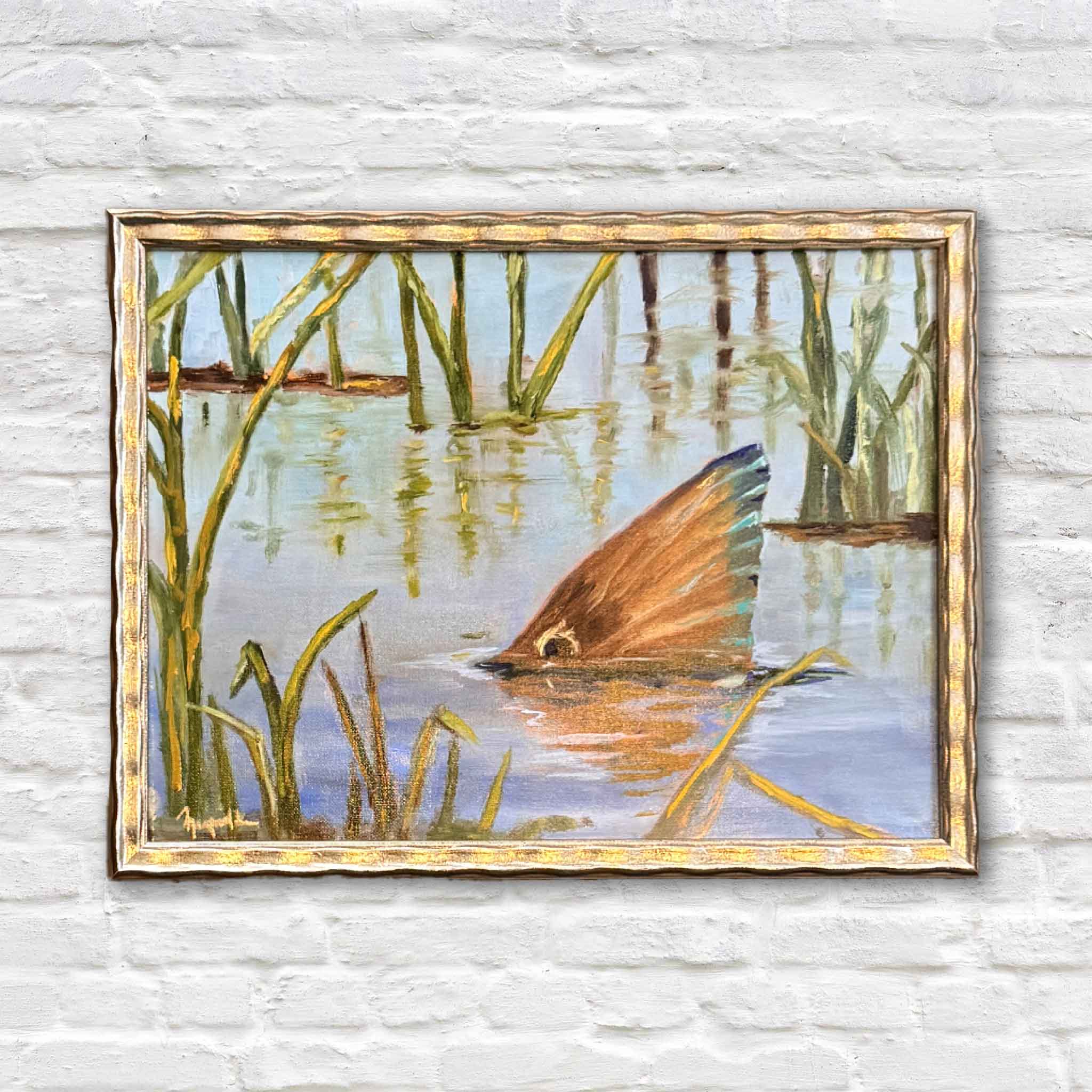Original oil painting by Jenny Reynolds featuring a spottail redfish rising through the Lowcountry marsh, framed in warm gold.