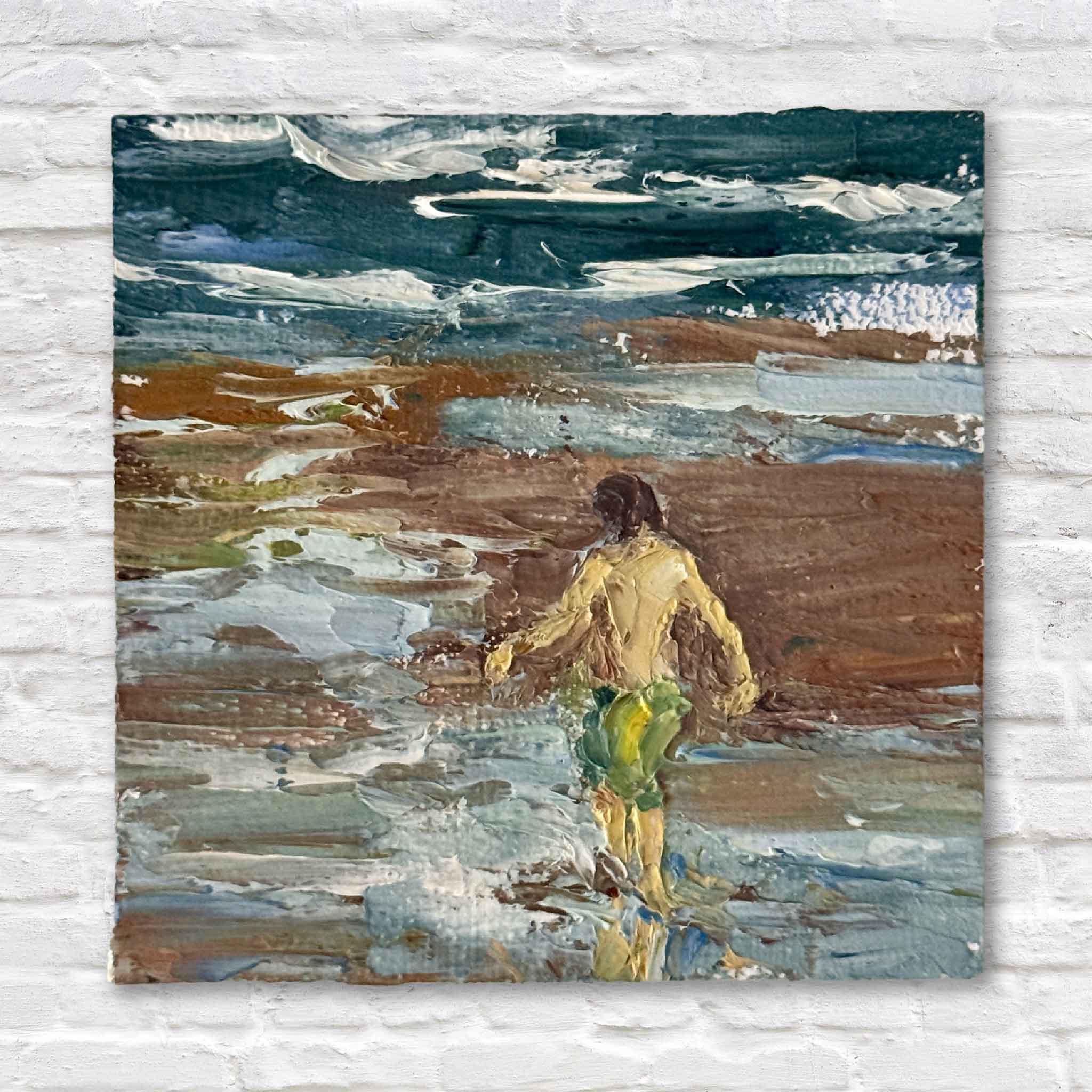 Mini original oil painting by Joanne Willoughby showing a young boy walking along the shoreline, with textured brushstrokes depicting waves, sand, and coastal light.