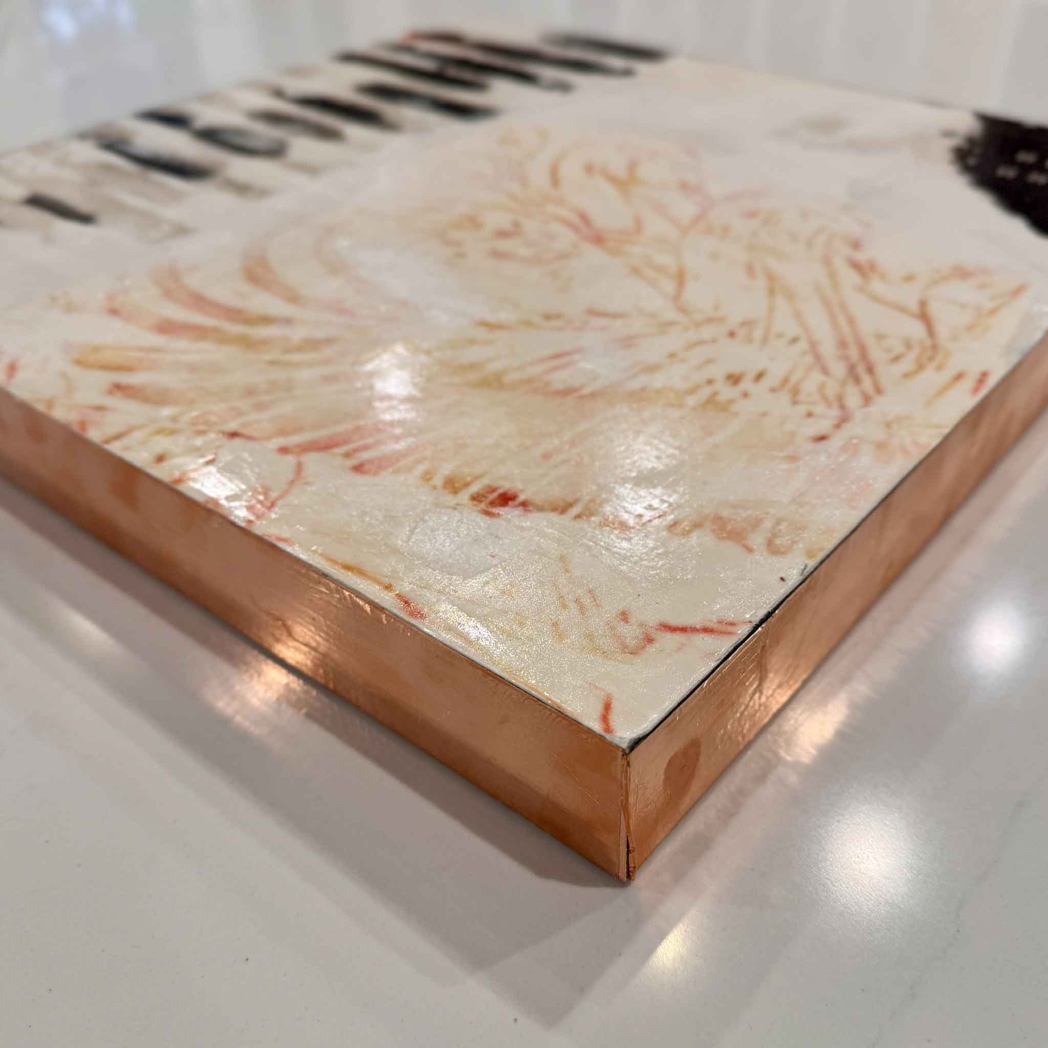 Side angle of Foggy Pelican showing the glossy resin surface and rose-gold leaf edges on the 16x16 panel.