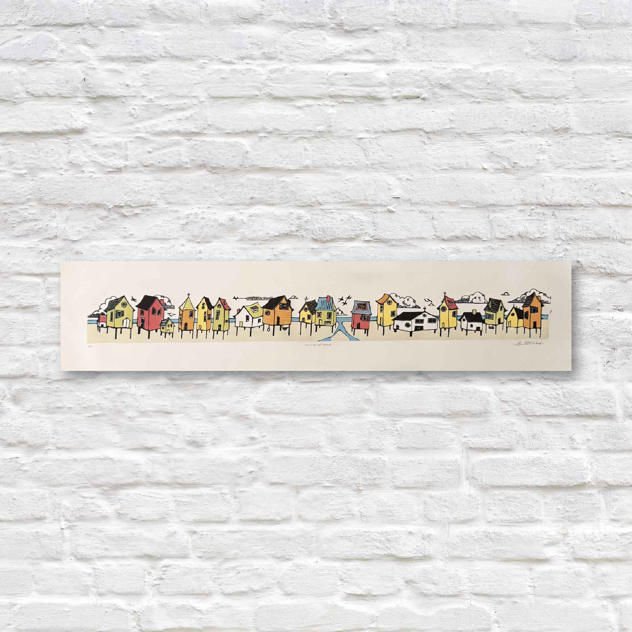 Original hand-pulled linocut reduction print titled Stick House Beach by Laurie McIntosh featuring a whimsical row of colorful stilted beach cottages, birds overhead, and playful coastal details inspired by life along the South Carolina coast