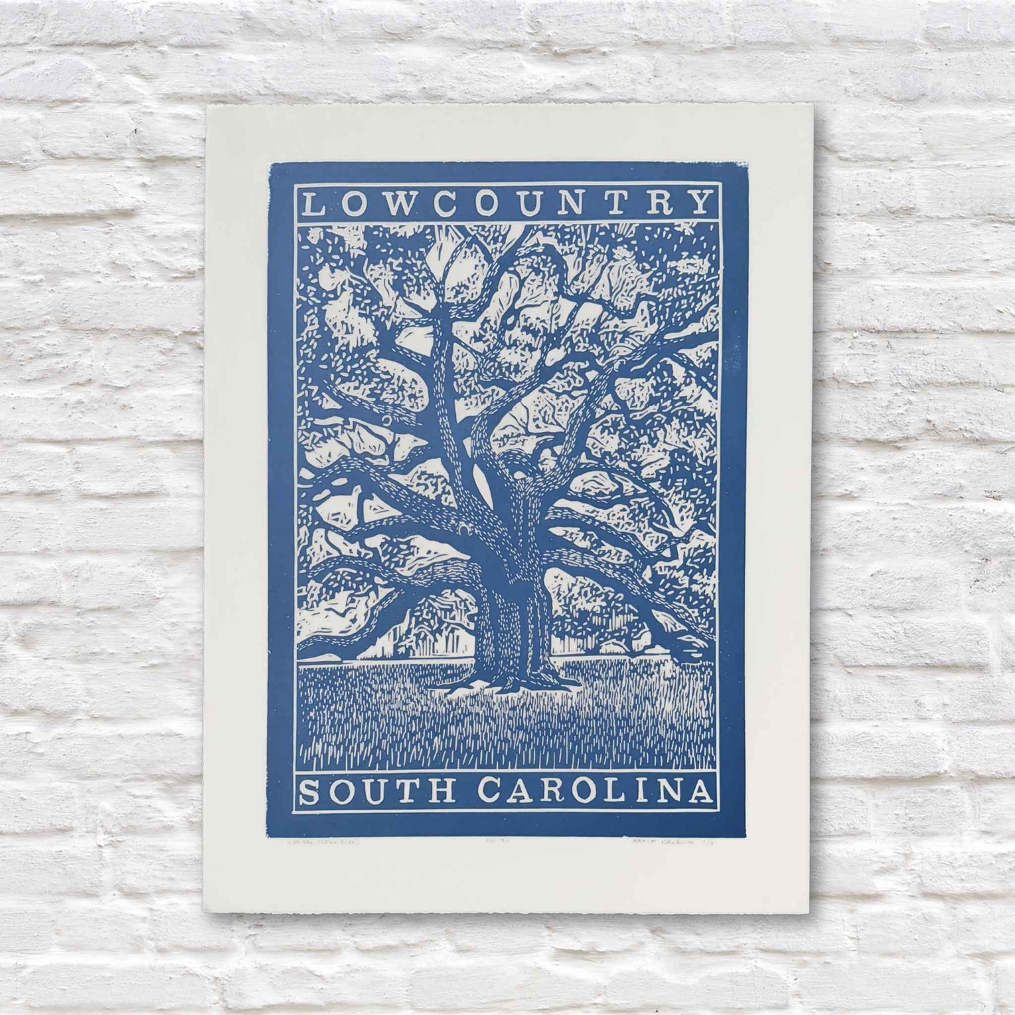 Live Oak linocut print by Aaron Baldwin in blue ink, featuring a sprawling Southern oak and Lowcountry landscape.