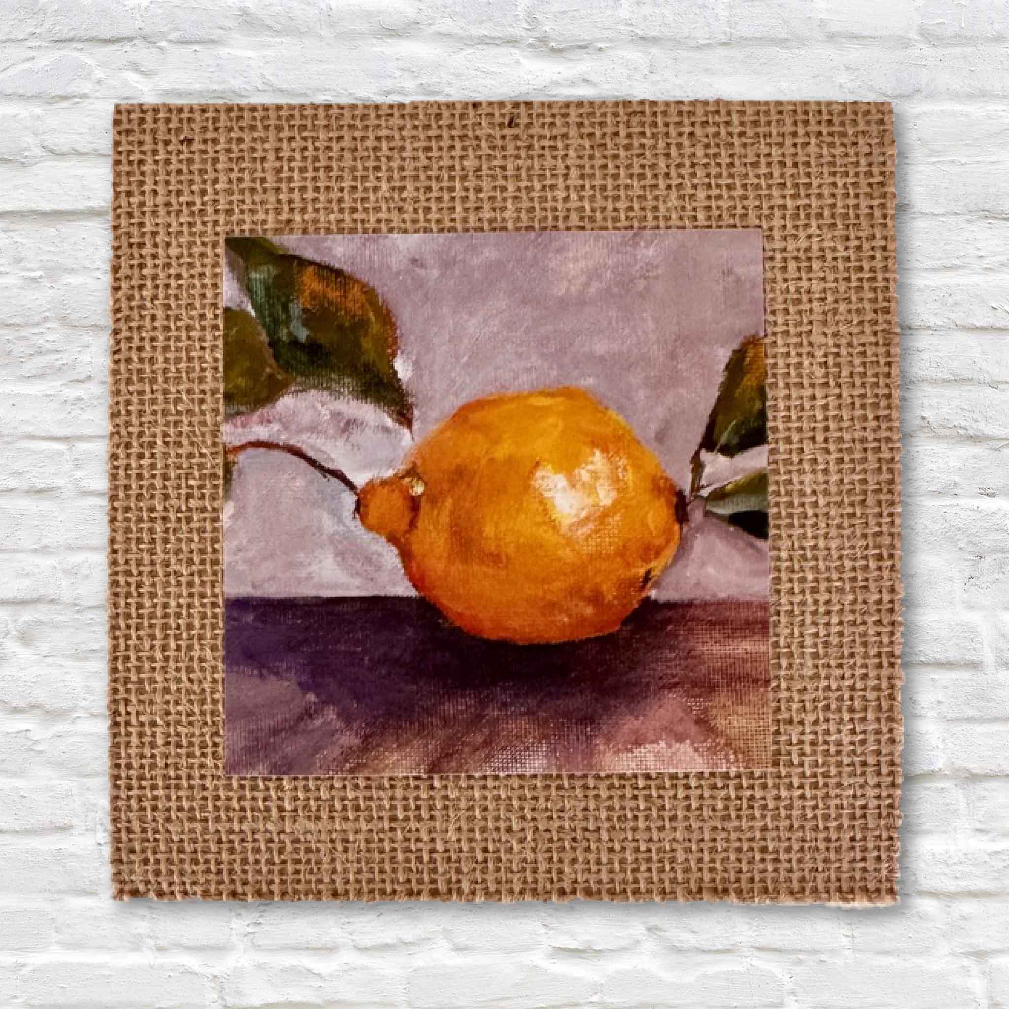 Primary product image of “Main Squeeze” by Jeanne O’Neal, a 4x4 inch lemon art print centered on a 6x6 textured burlap mat. Photographed at Gray Man Gallery in Pawleys Island, South Carolina, this Lowcountry local artist print highlights vibrant citrus color, expressive brushwork, and coastal charm.