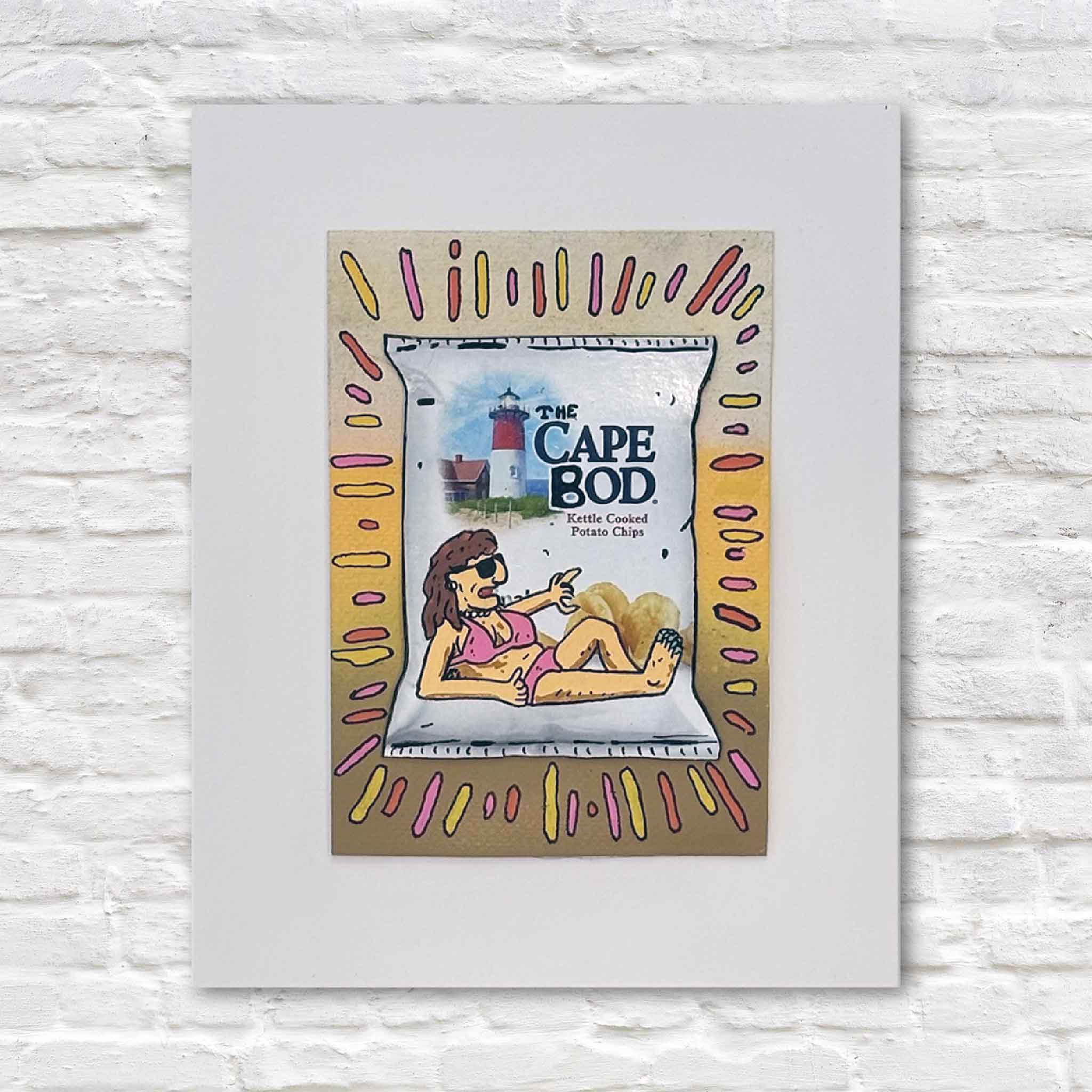 Cape Bod Pink by Charleston artist Nick Kawczynski. Original mixed media artwork painted on a reclaimed Cape Cod chip box featuring a beachgoer lounging in the sun. Available at Gray Man Gallery in Pawleys Island, South Carolina.