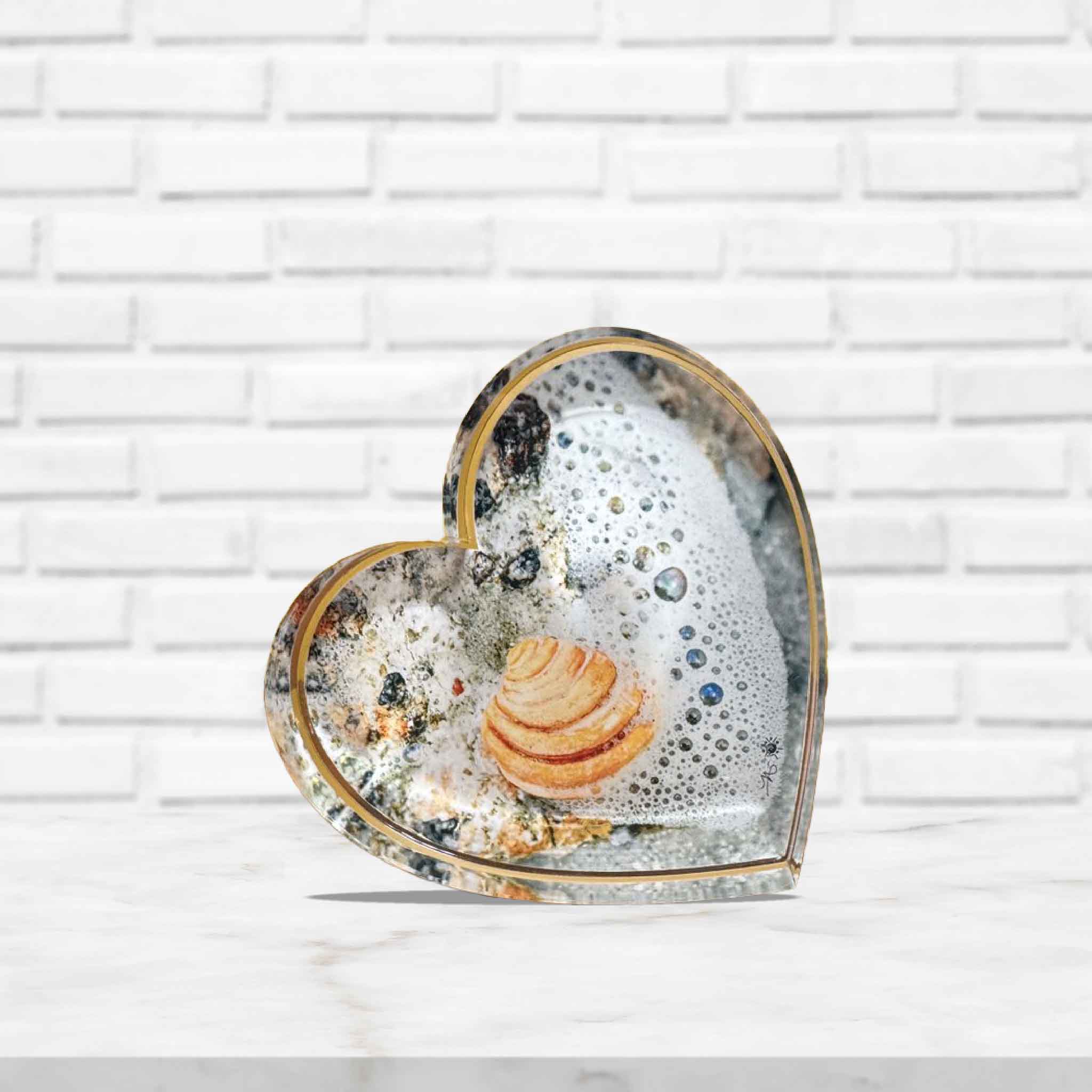 Heart-shaped acrylic block featuring a Pawleys Island shell photograph by Tanya Ackerman, part of the Pieces of Pawleys collection.