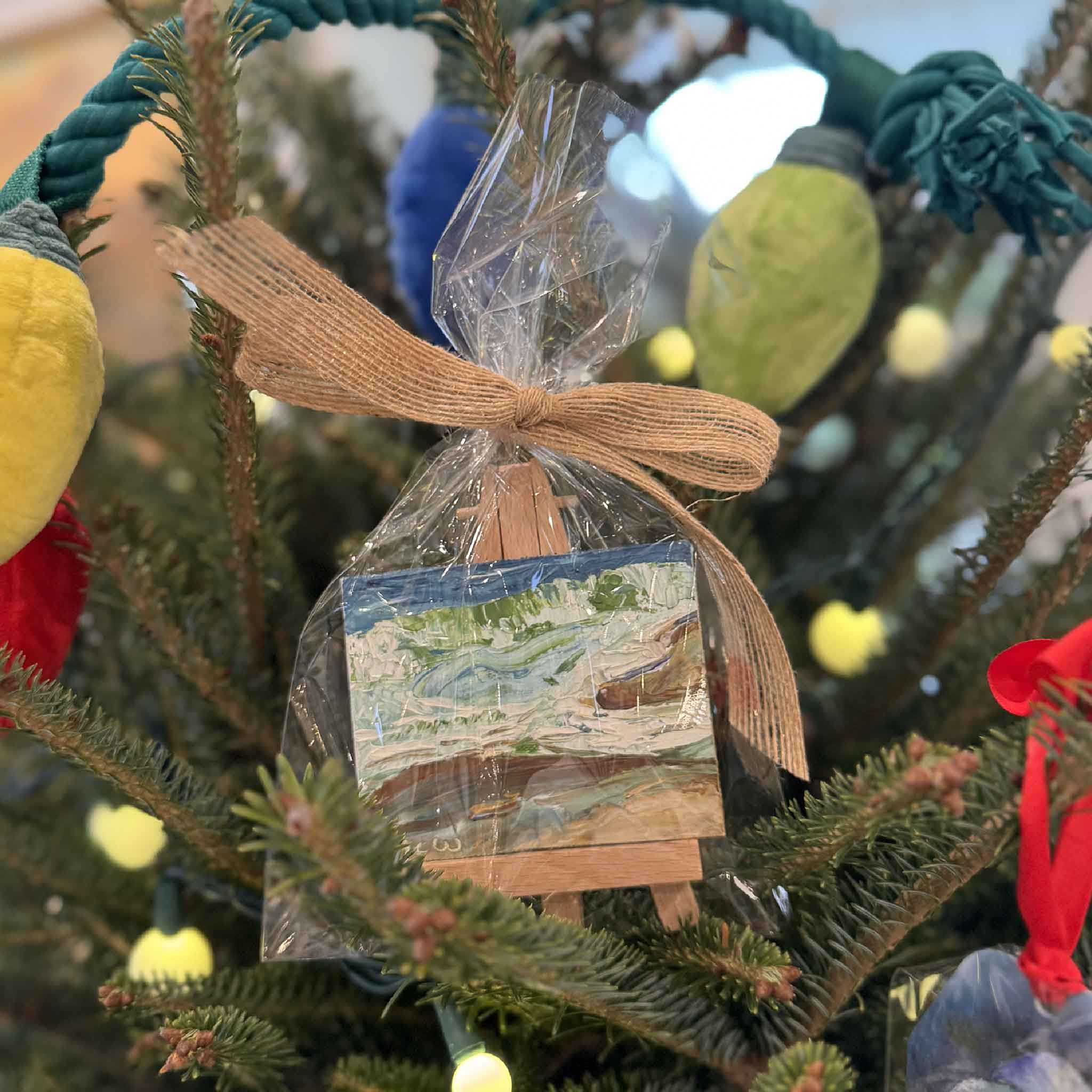 This image features Seabreeze, an original mini oil painting by Joanne Willoughby, showcasing thick coastal brushwork with crashing waves and shoreline textures.