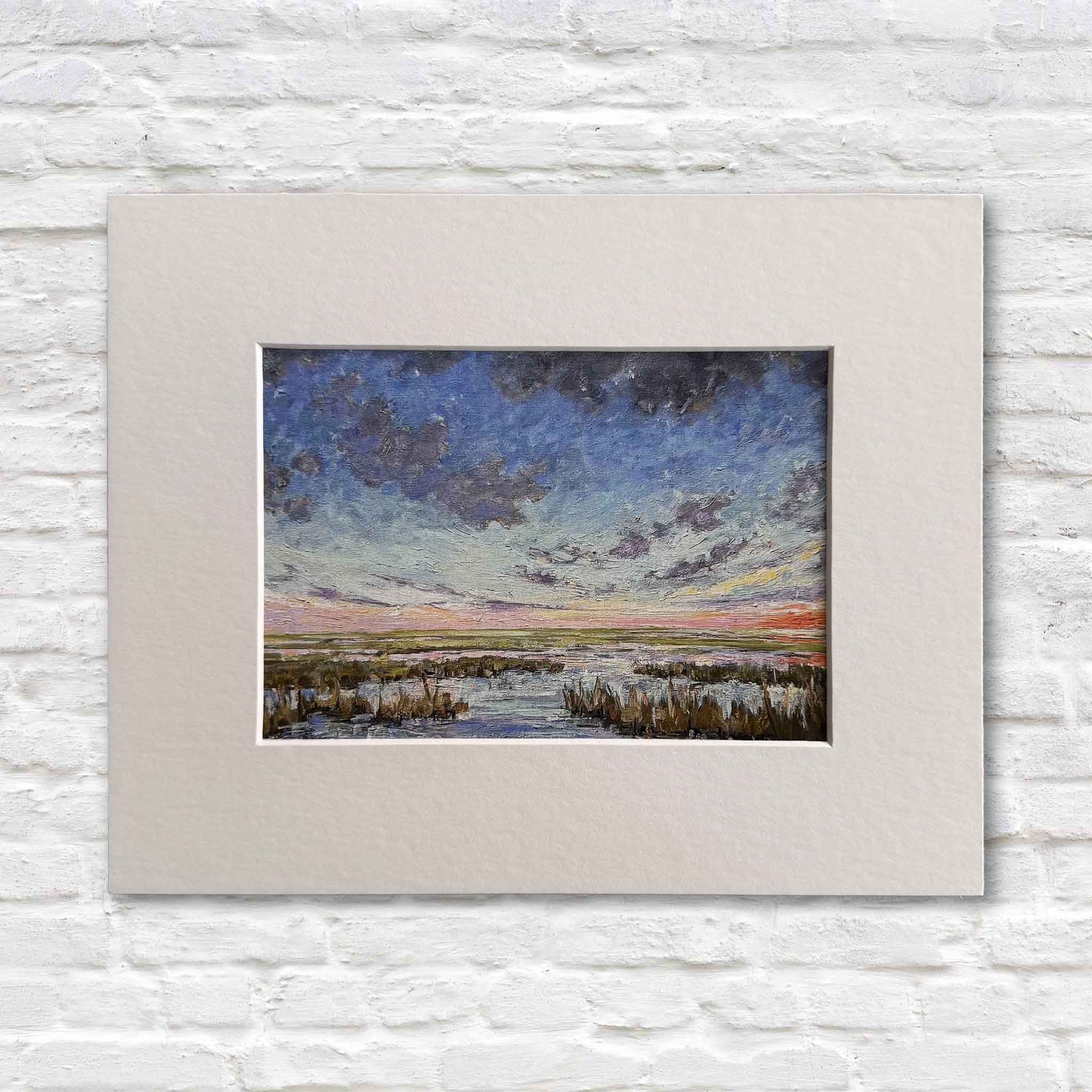 Symphony is an 8 × 10 fine art giclée by Jeanne O’Neal, professionally matted and featuring a vibrant Lowcountry sunset with layered clouds and marsh reflections.