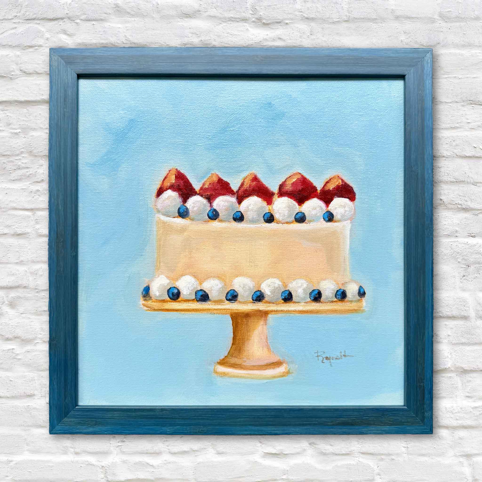 Tastes Like Summer Pound Cake by local artist Jenny Reynolds, an original oil painting from her Southern Sweets collection featuring a strawberry pound cake topped with whipped cream and blueberries in a bright blue frame. Available at Gray Man Gallery in Pawleys Island, South Carolina.