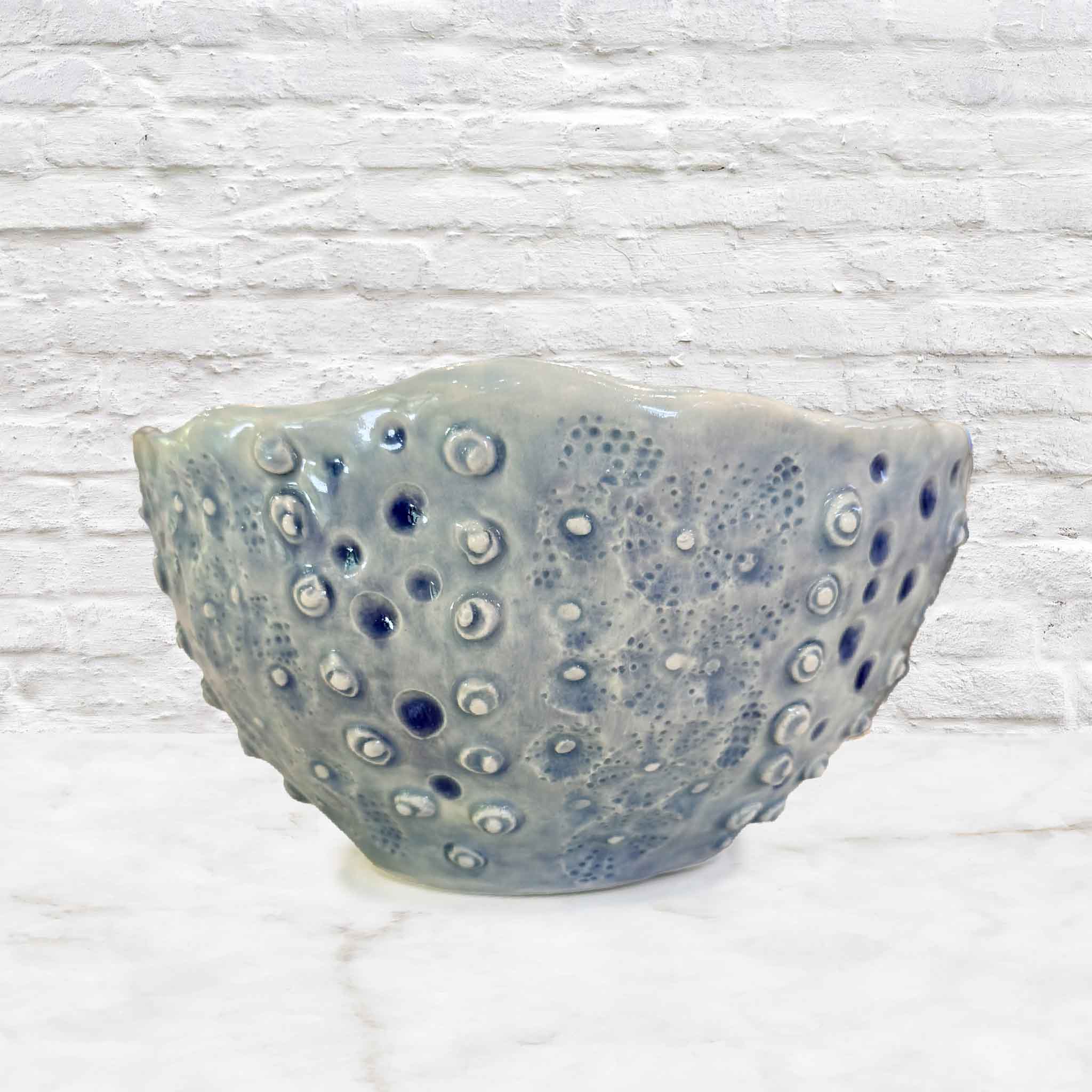 Tidepool Texture Bowl by local artist Vida Miller featuring raised barnacle-like texture and seafoam coastal glaze handmade in Pawleys Island at Gray Man Gallery