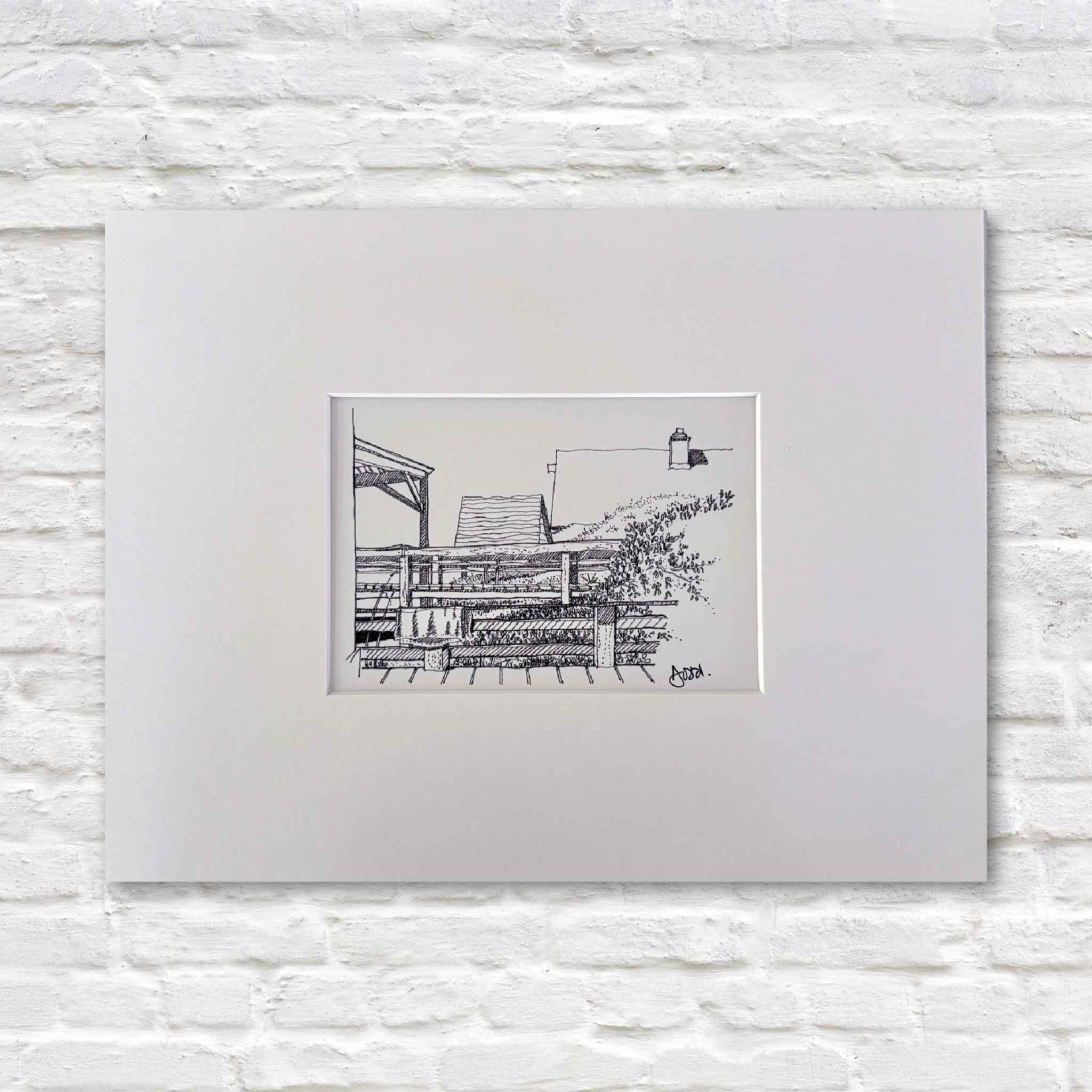 Rooftops Looking South by Todd Halamka, a pen-and-ink print depicting classic Pawleys Island beach house rooftops, porch railings, and dune vegetation. Professionally matted by Gray Man Gallery to fit a standard 11x14 frame, this nostalgic coastal artwork celebrates the character and charm of Old Pawleys.