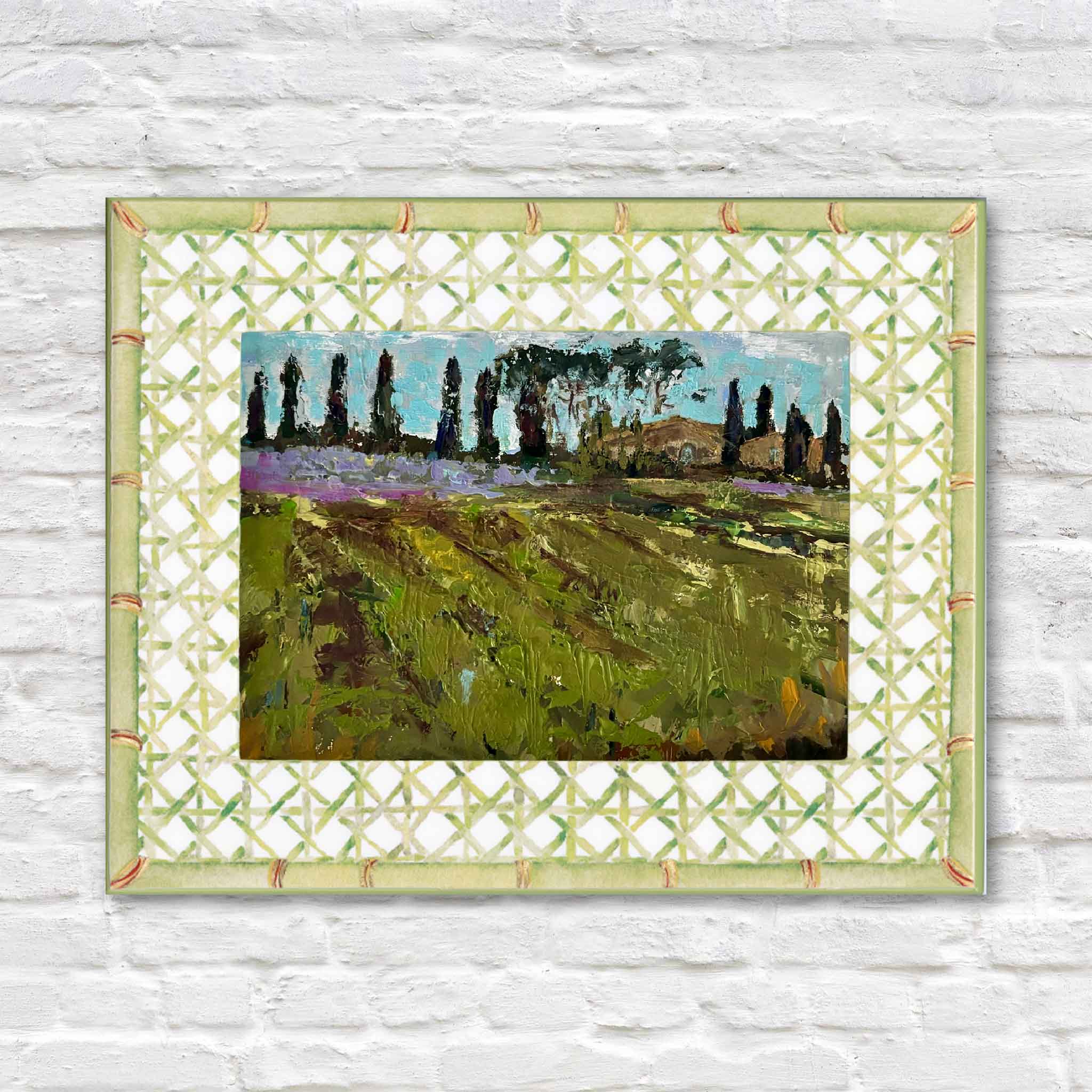Trellis Green 5x7 lacquer picture frame displayed with original artwork inside at Gray Man Gallery. Featuring a faux bamboo border and classic trellis pattern, this decorative coastal frame is perfect for displaying photographs, fine art prints, or original artwork in Lowcountry homes.