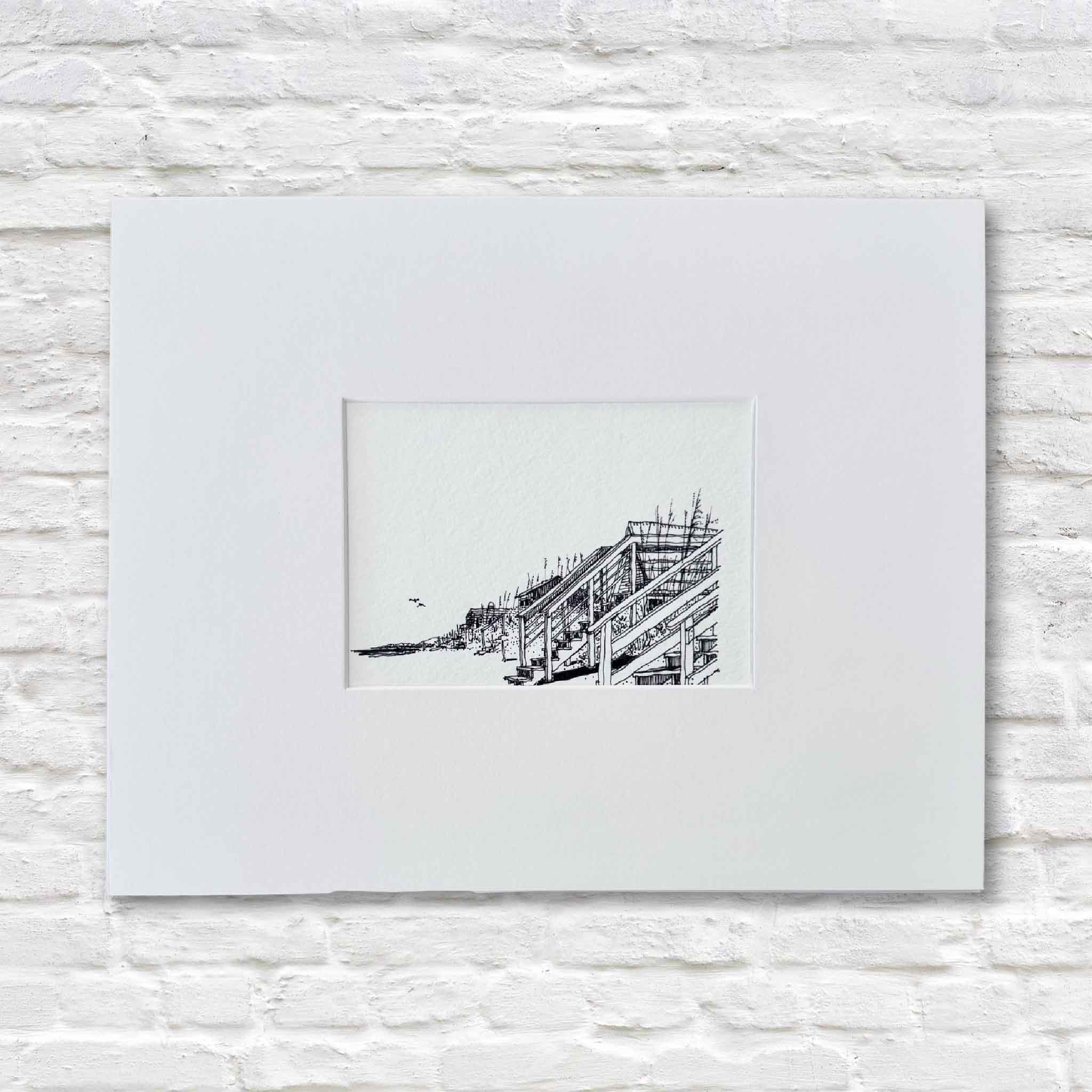wooden stairs lead down to the shoreline. Crisp lines and precise shading convey the texture of weathered wood, dune grasses, and the distant horizon