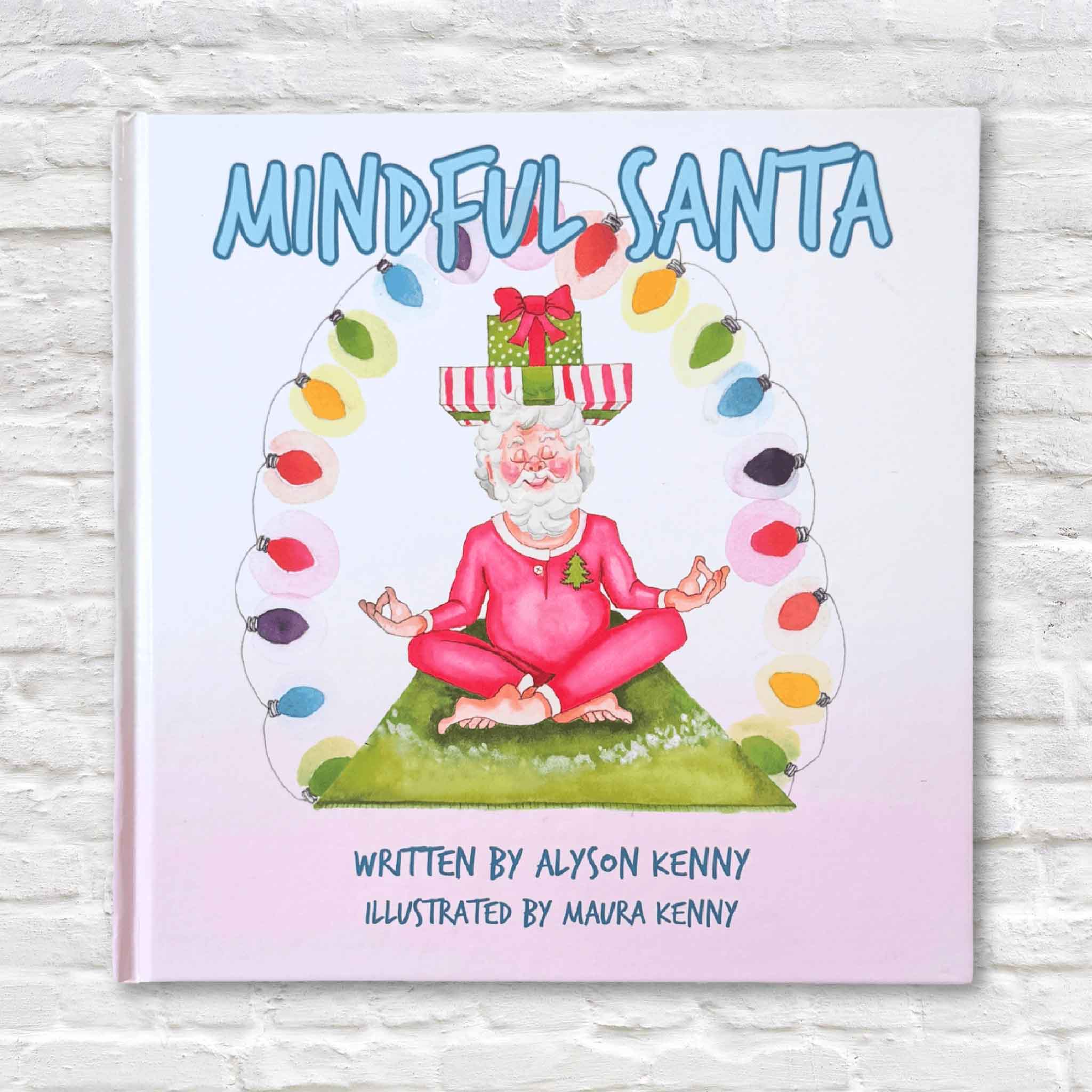 Book cover of 'Mindful Santa' with a illustrated character meditating and surrounded by lights on a light gray background.