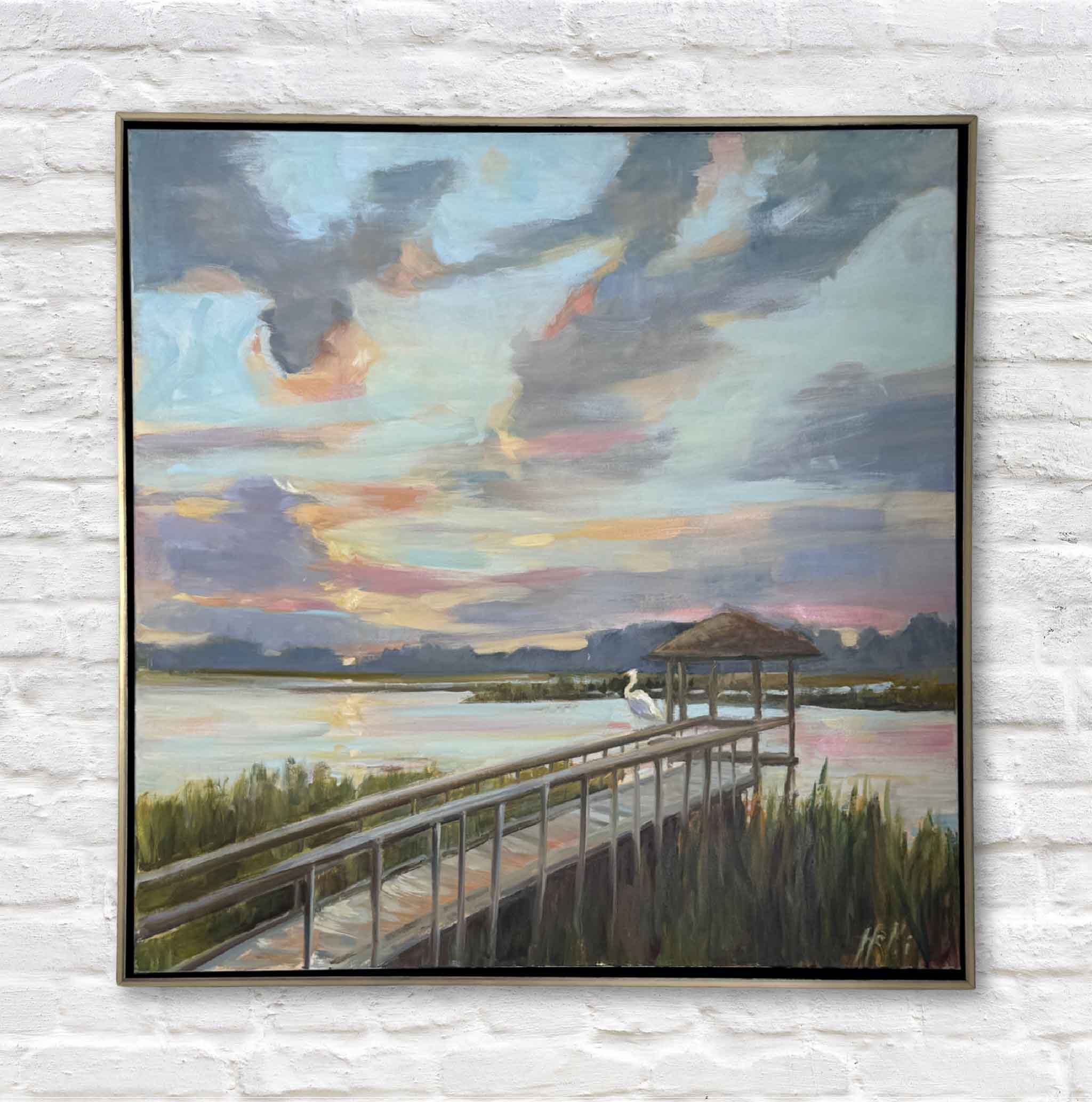 Painting of a dock with a bird and a colorful sky on a white brick wall.