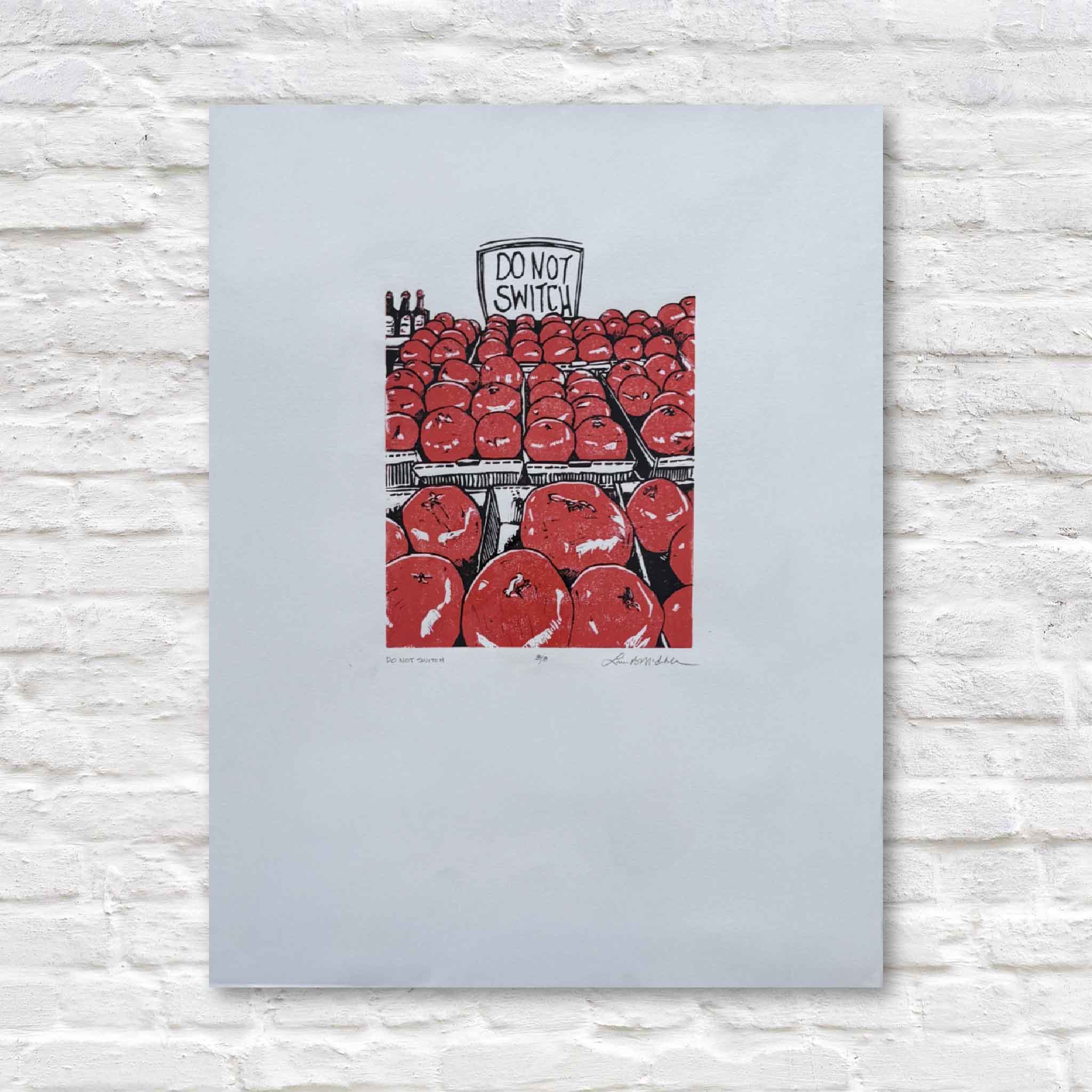Art print with red apples and a 'Do Not Switch' sign on a light blue background
