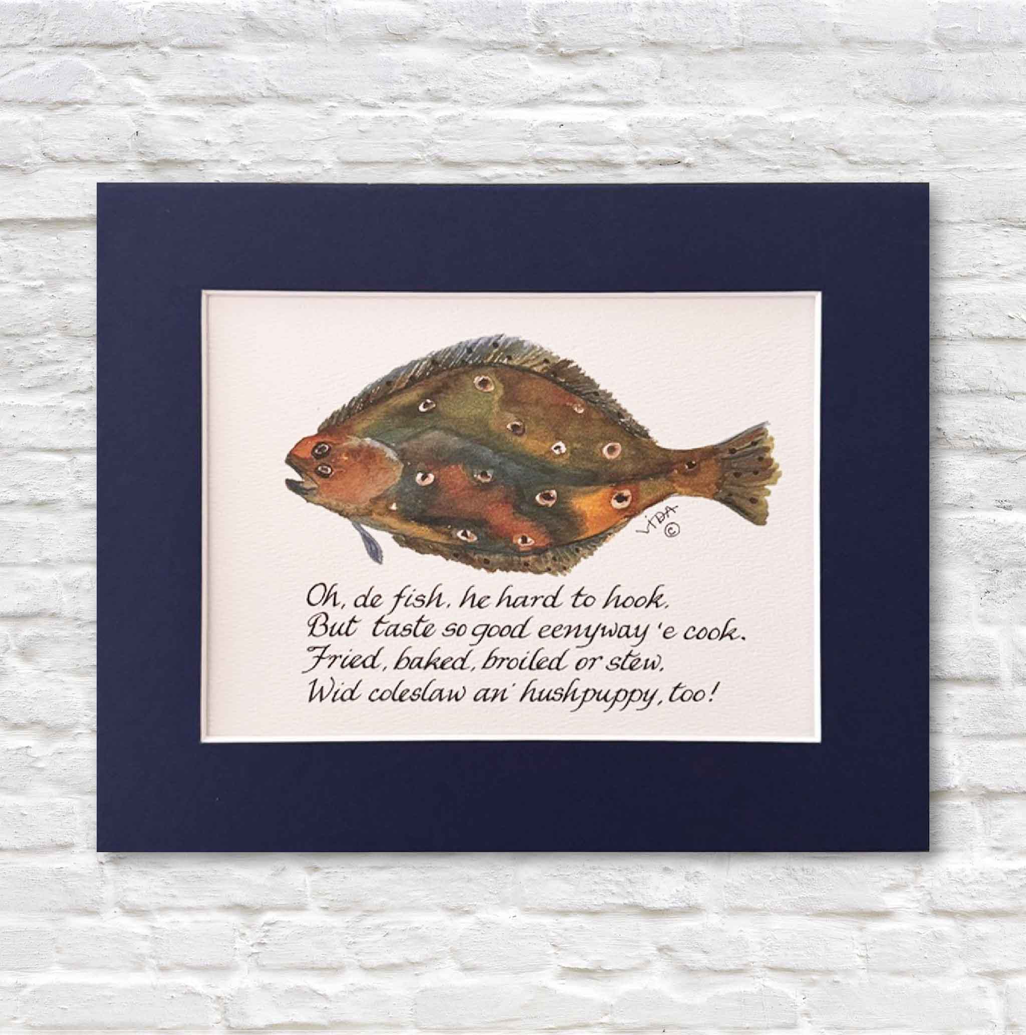 matted print with a fish illustration and text on a white brick wall background
