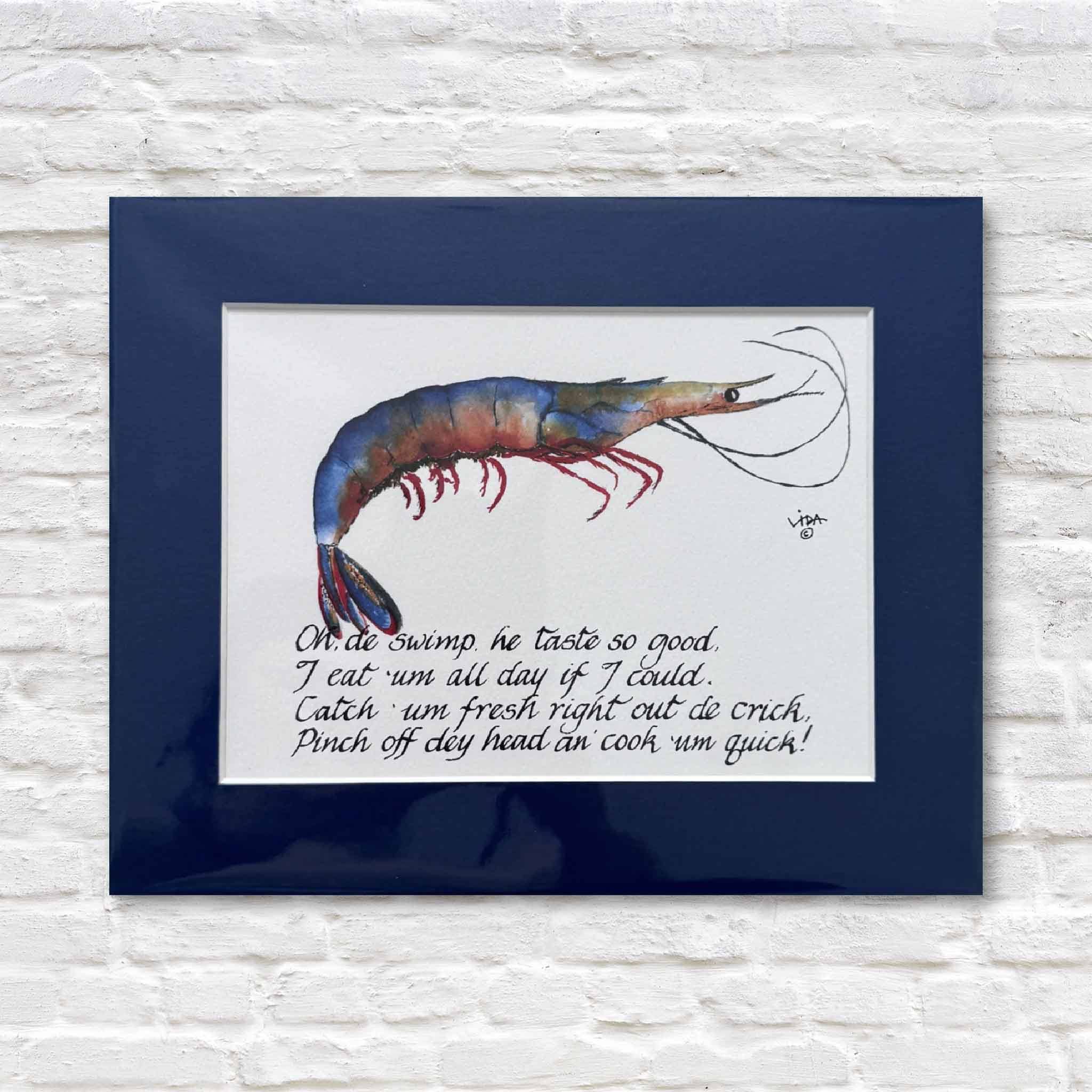matted artwork of a shrimp with text on a white brick wall background