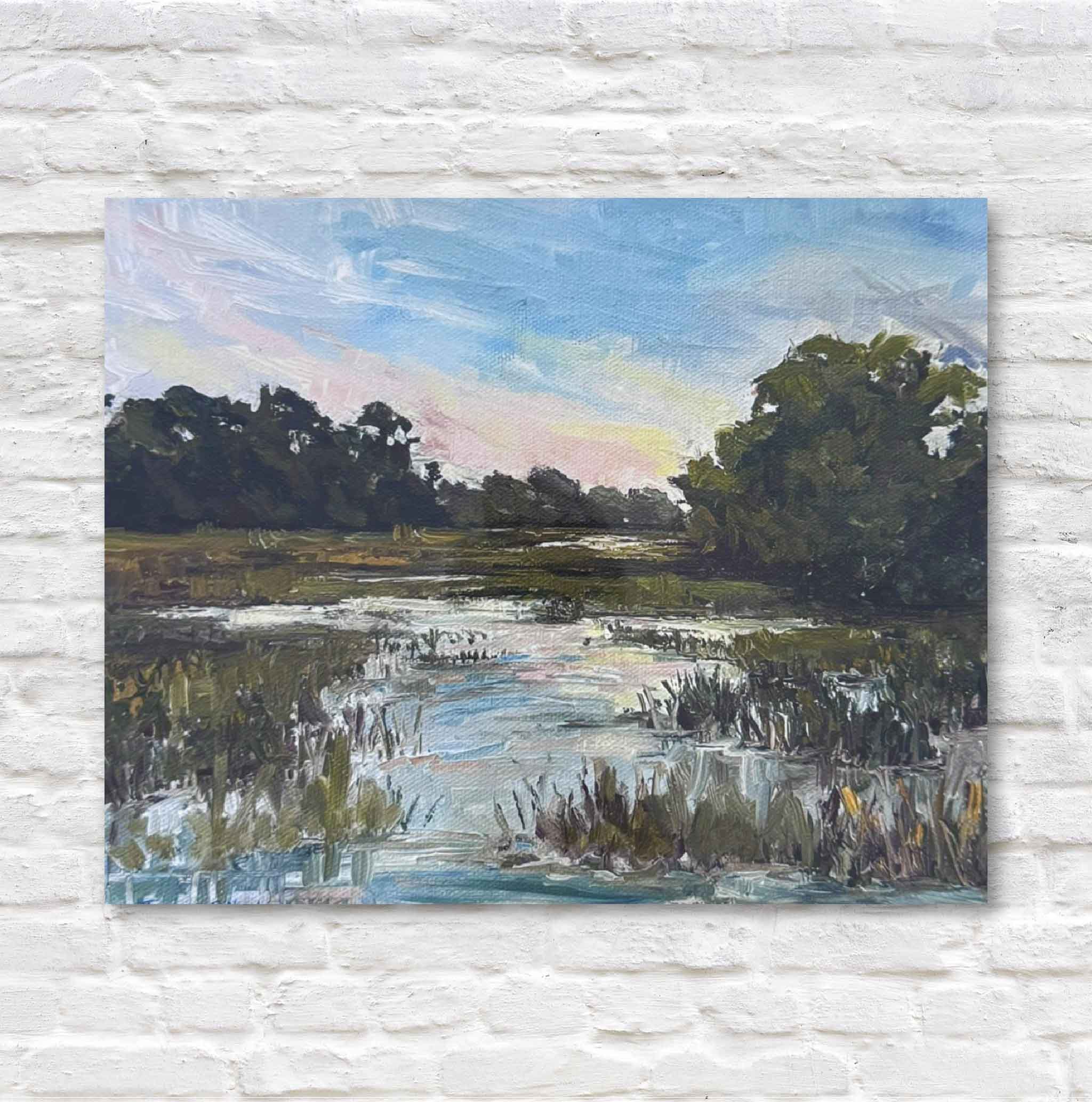 Painting of a landscape with trees and water on a textured white wall.