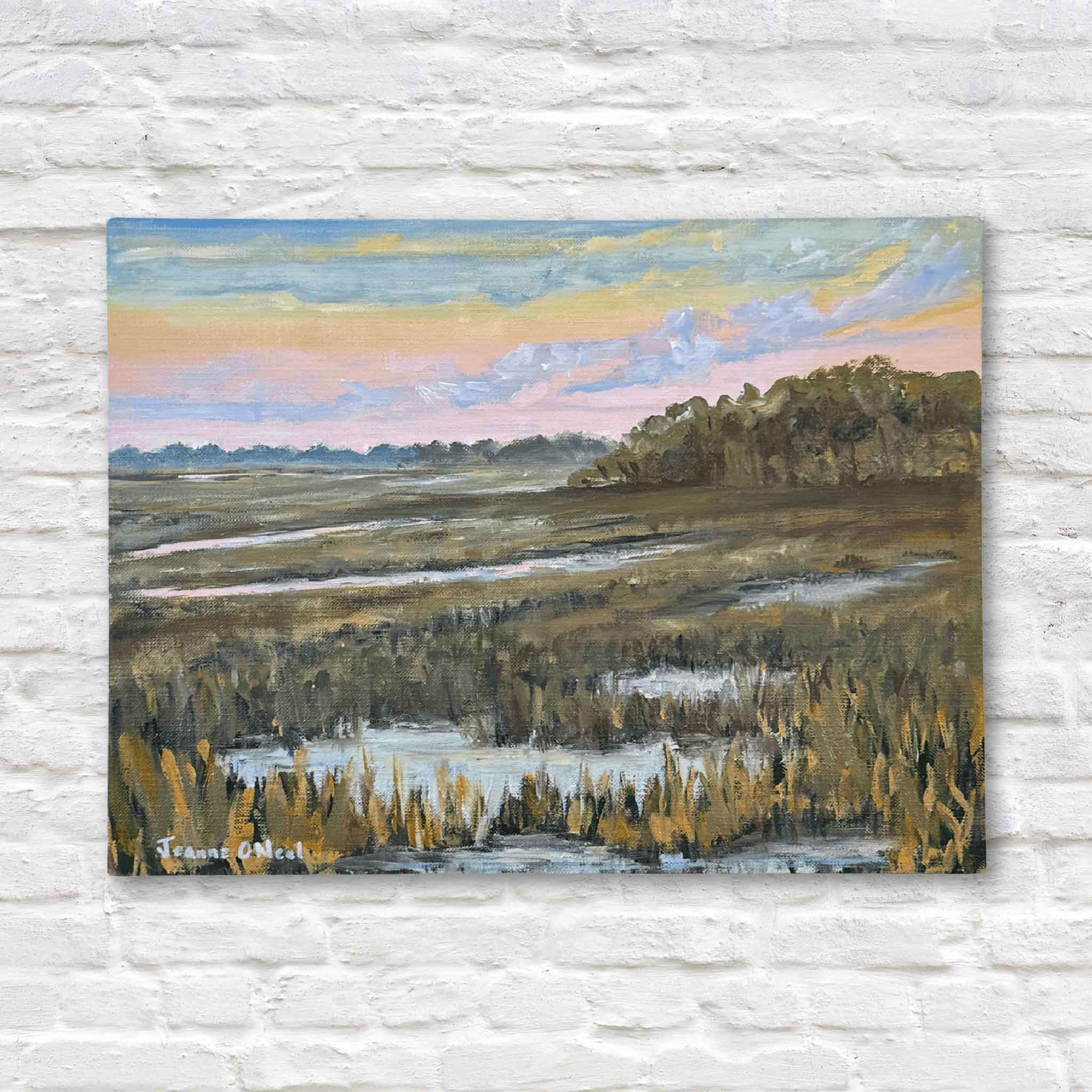 Painting of a landscape with a field, trees, and a colorful sky on a textured white wall.