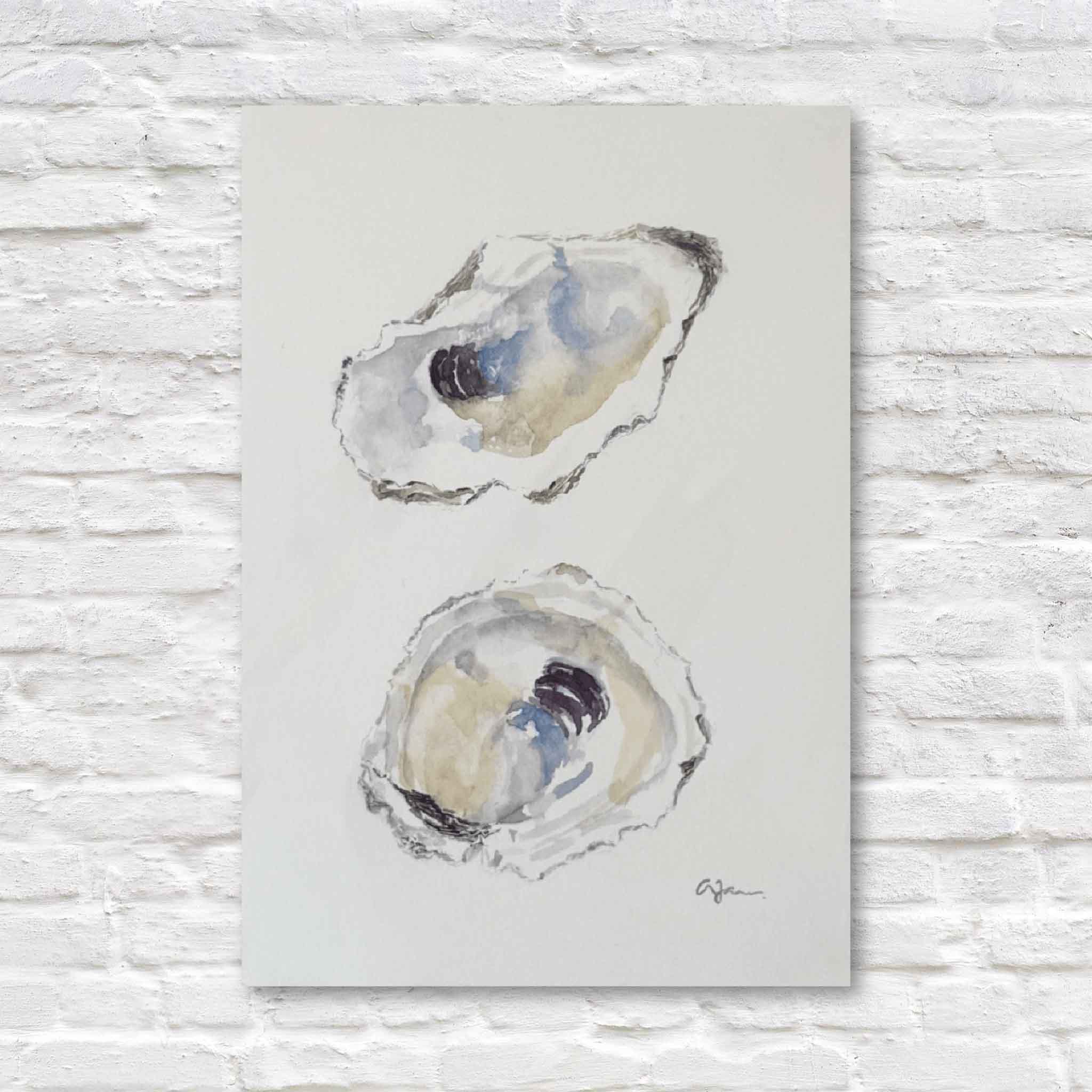 Two oyster shells on a textured white background