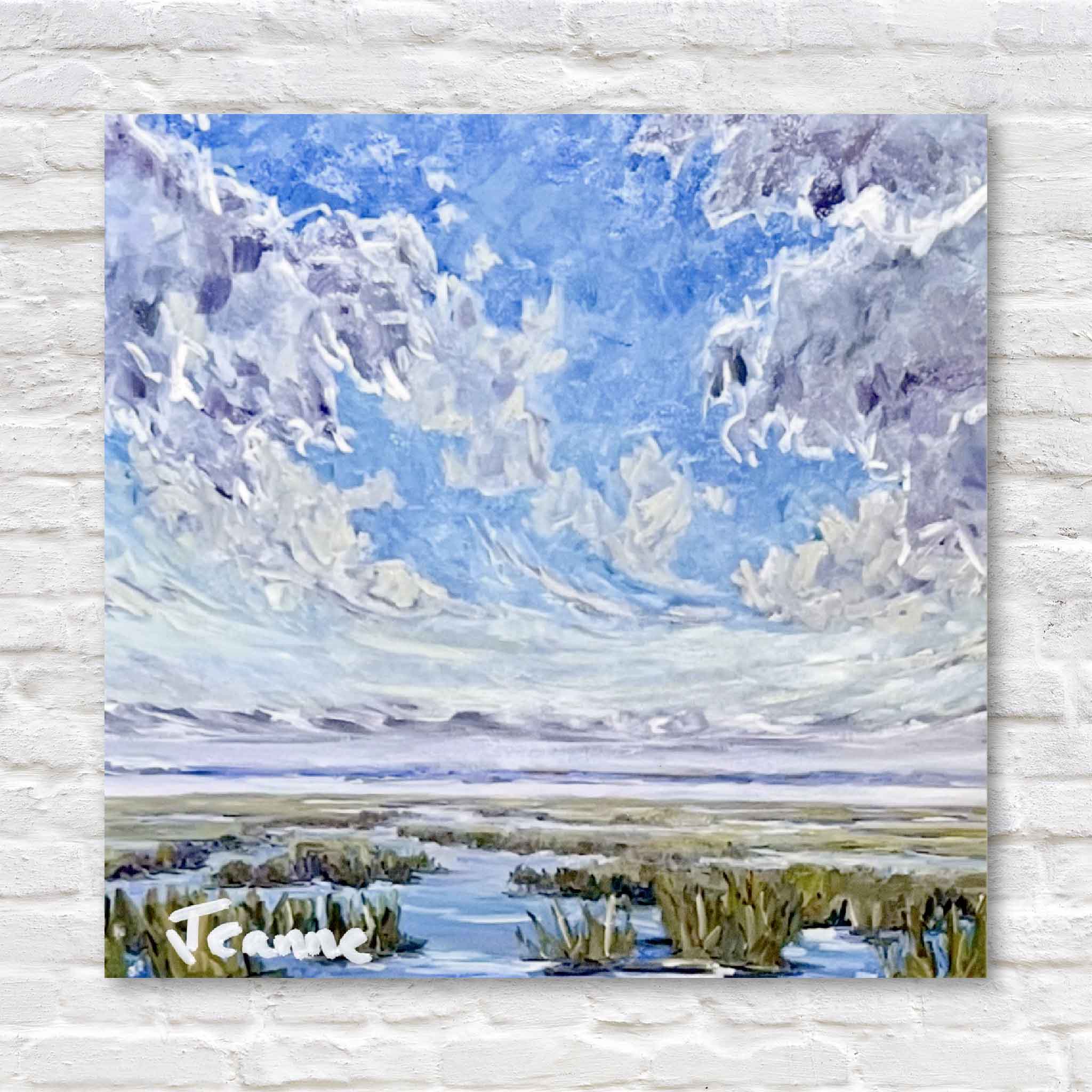 Painting of lowcountry marsh and clouds on a white brick wall