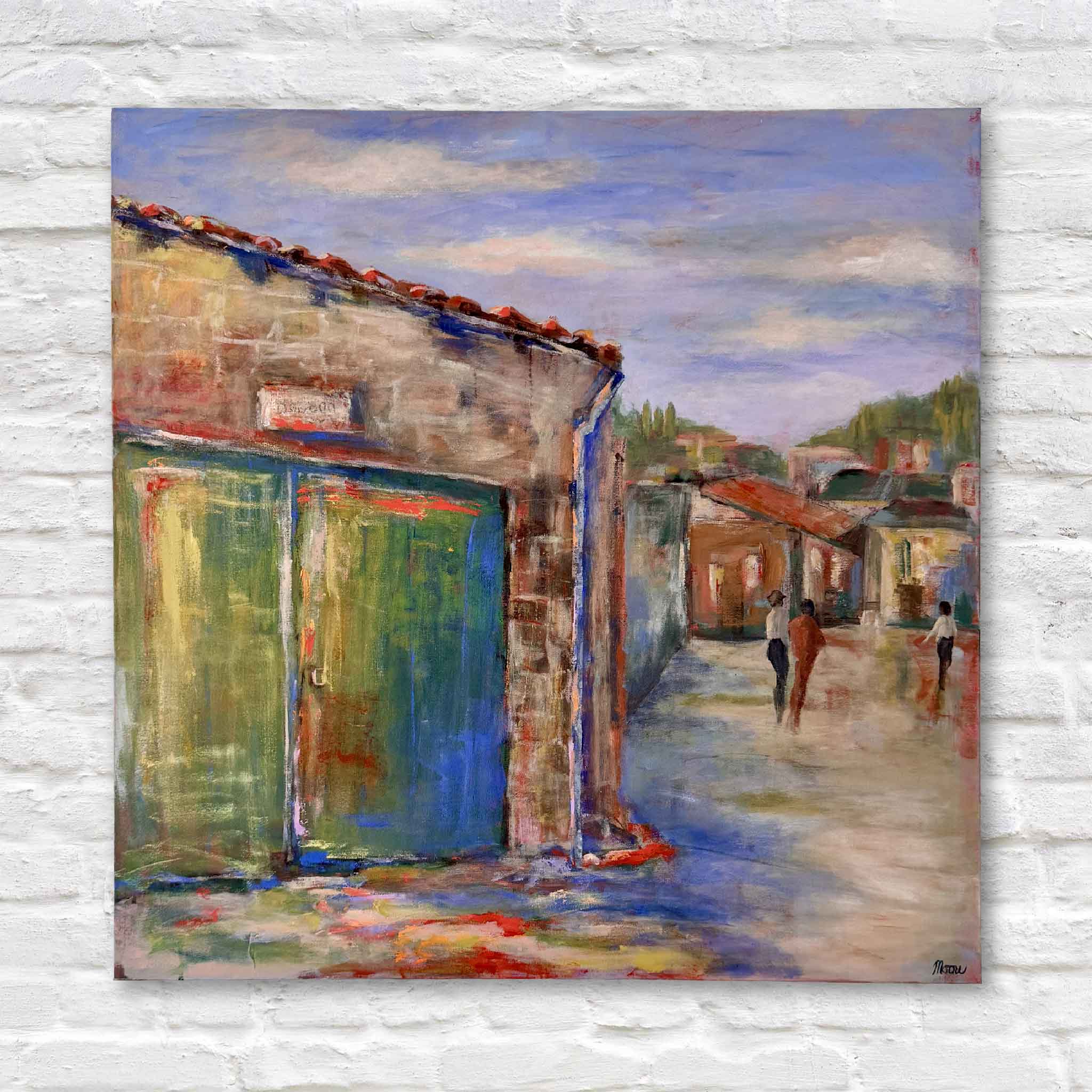Painting of a street scene with buildings and people on a white brick wall.