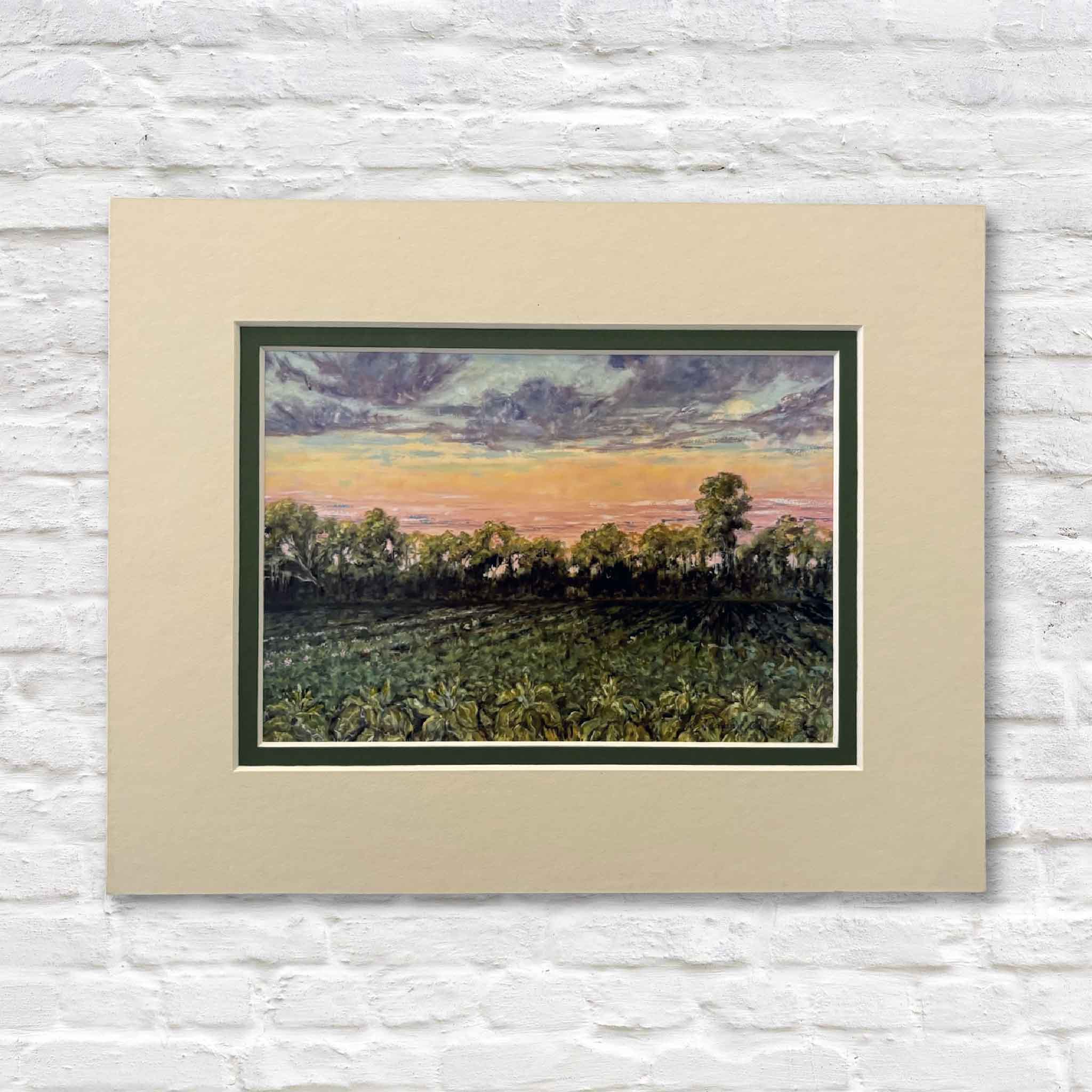 Matted giclée print of “Tobacco Fields” by Jeanne O’Neal showing rows of green tobacco under a colorful South Carolina sunset sky.